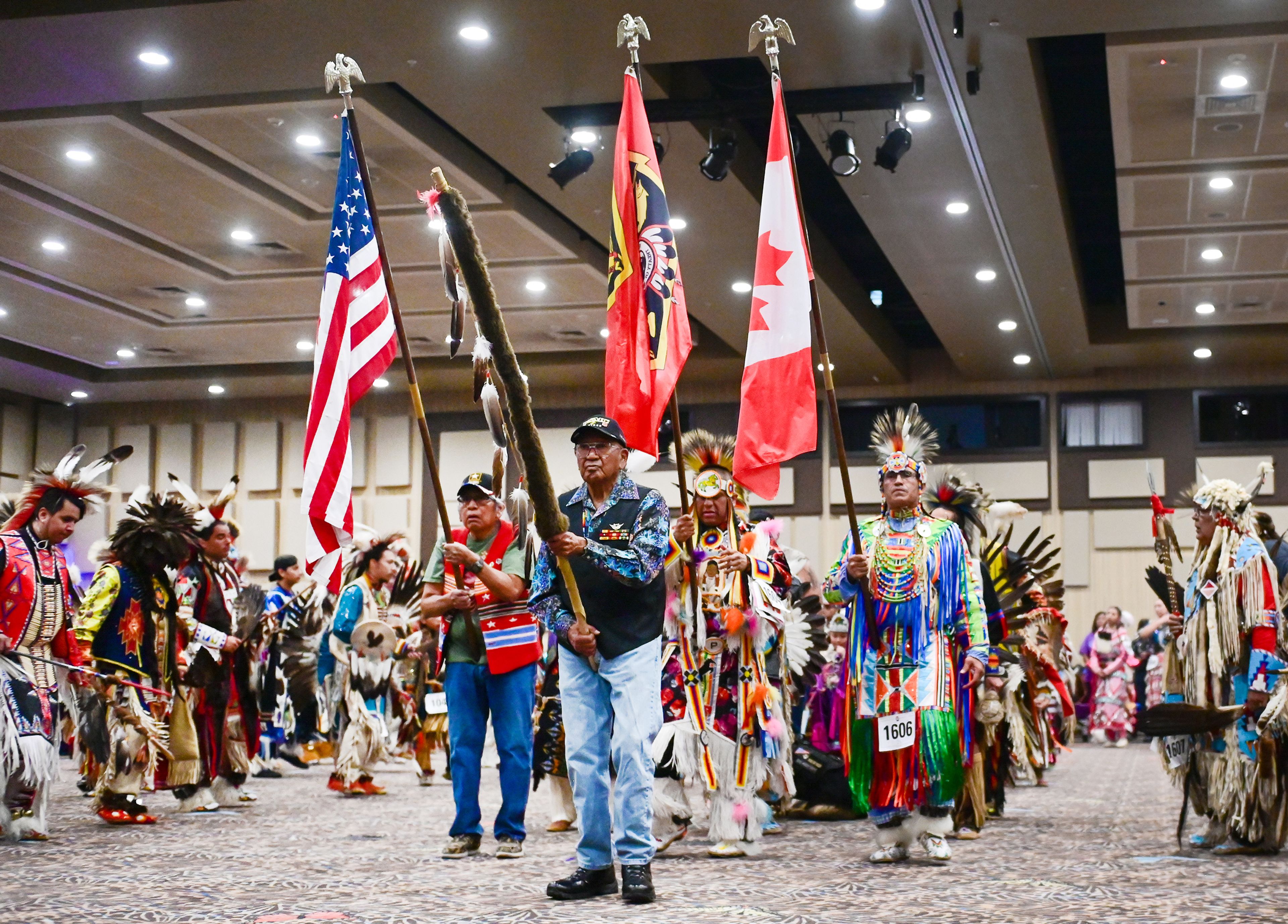 Veterans were honored for their service and recognized for taking part in the Grand Entry Saturday. ,