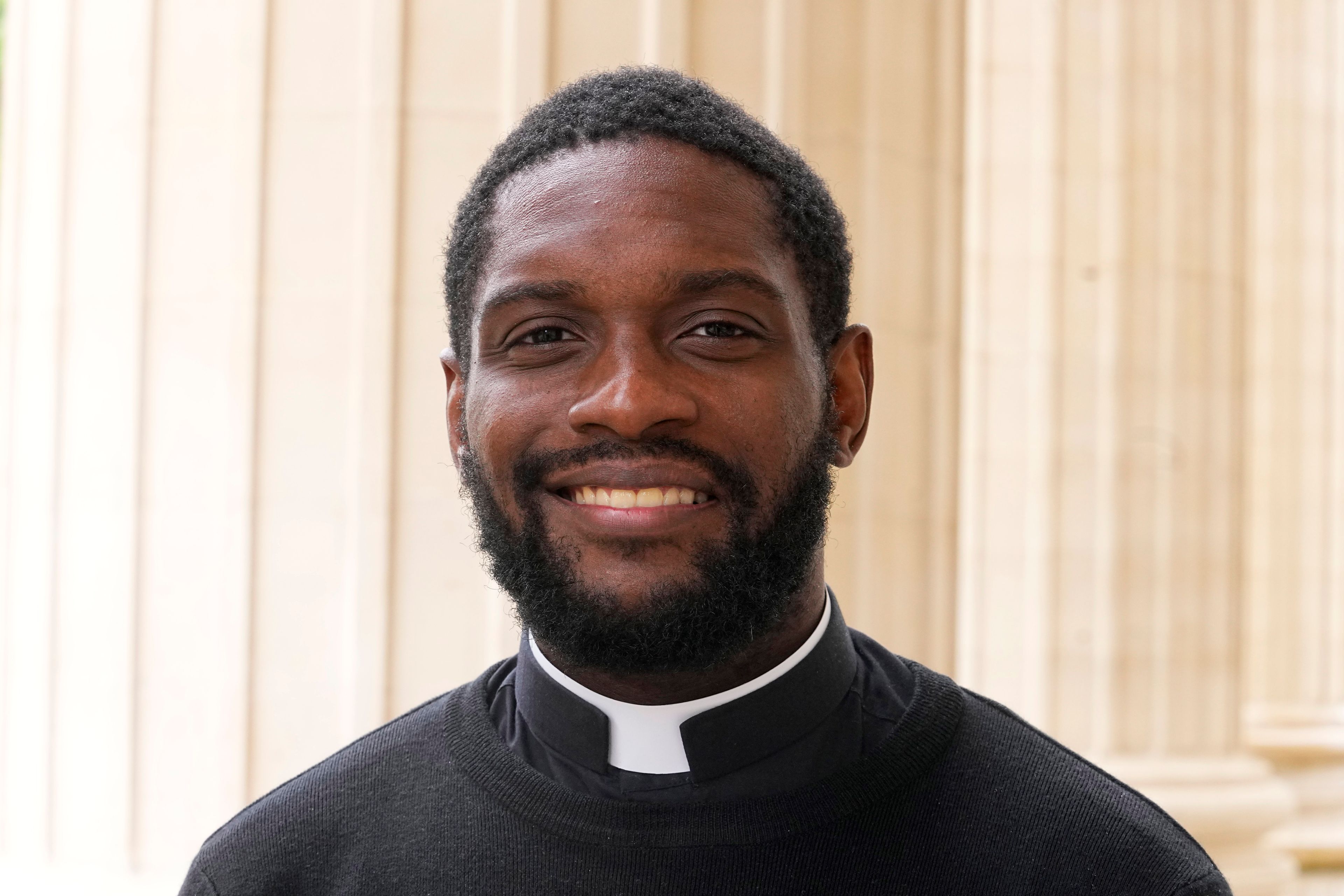 Jason Nioka, a former judo champion and deacon who's in charge of the largest contingent of Olympic chaplains, about 40 priests, nuns and lay Catholics, poses outside the Madeleine church, Thursday, May 30, 2024 in Paris. As athletes rev up their training and organizers finalize everything from ceremonies to podiums before the Paris Olympics, more than 120 faith leaders are preparing for a different challenge – spiritually supporting some 14,000 participants from around the world, especially those whose medal dreams will inevitably get crushed.