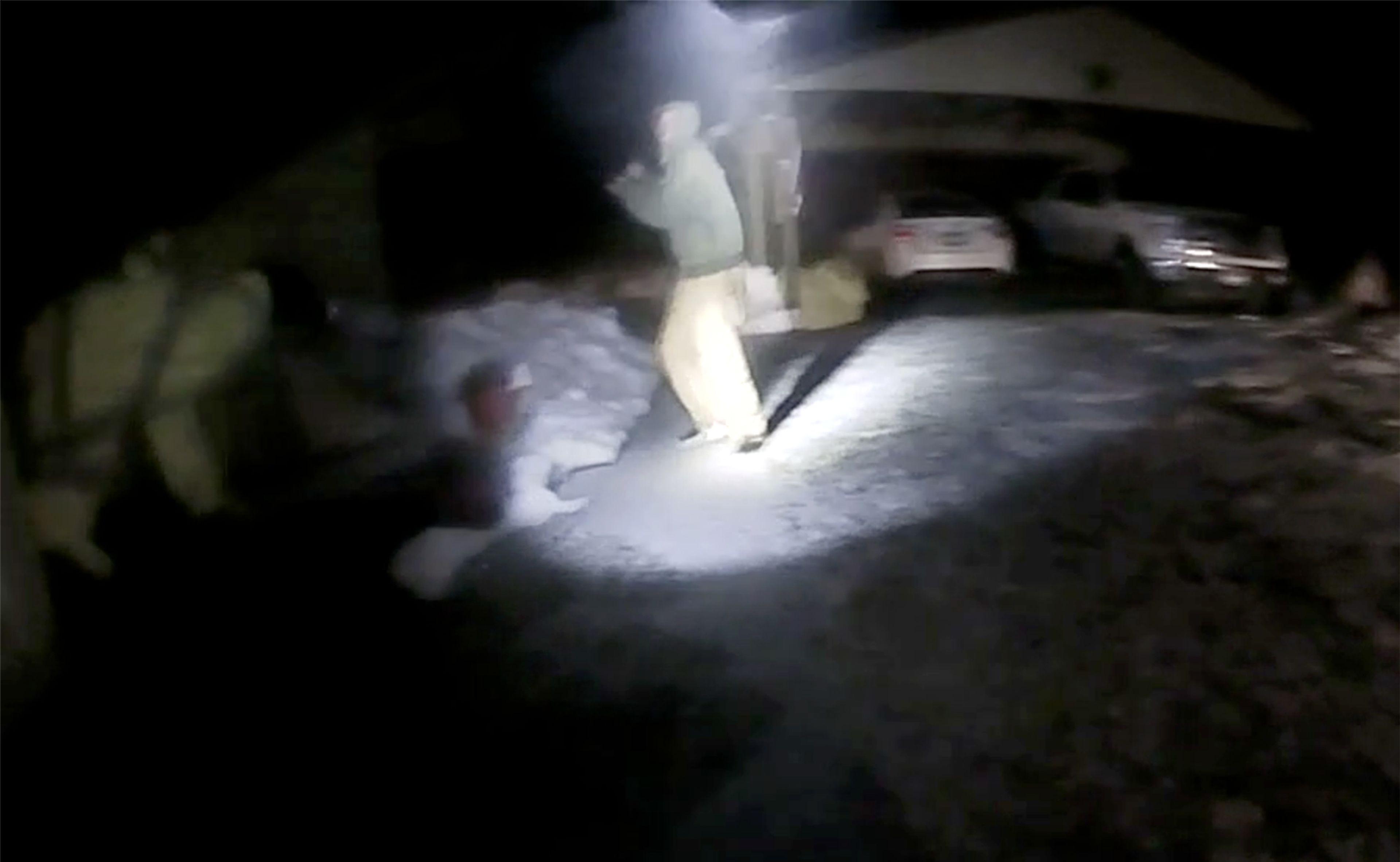 Michael J. Trappett turns toward two Clearwater County Sheriff's Office deputies while holding a knife in this image taken from one of the officer's body camera footage. The officers responded by shooting and kill Trappett.