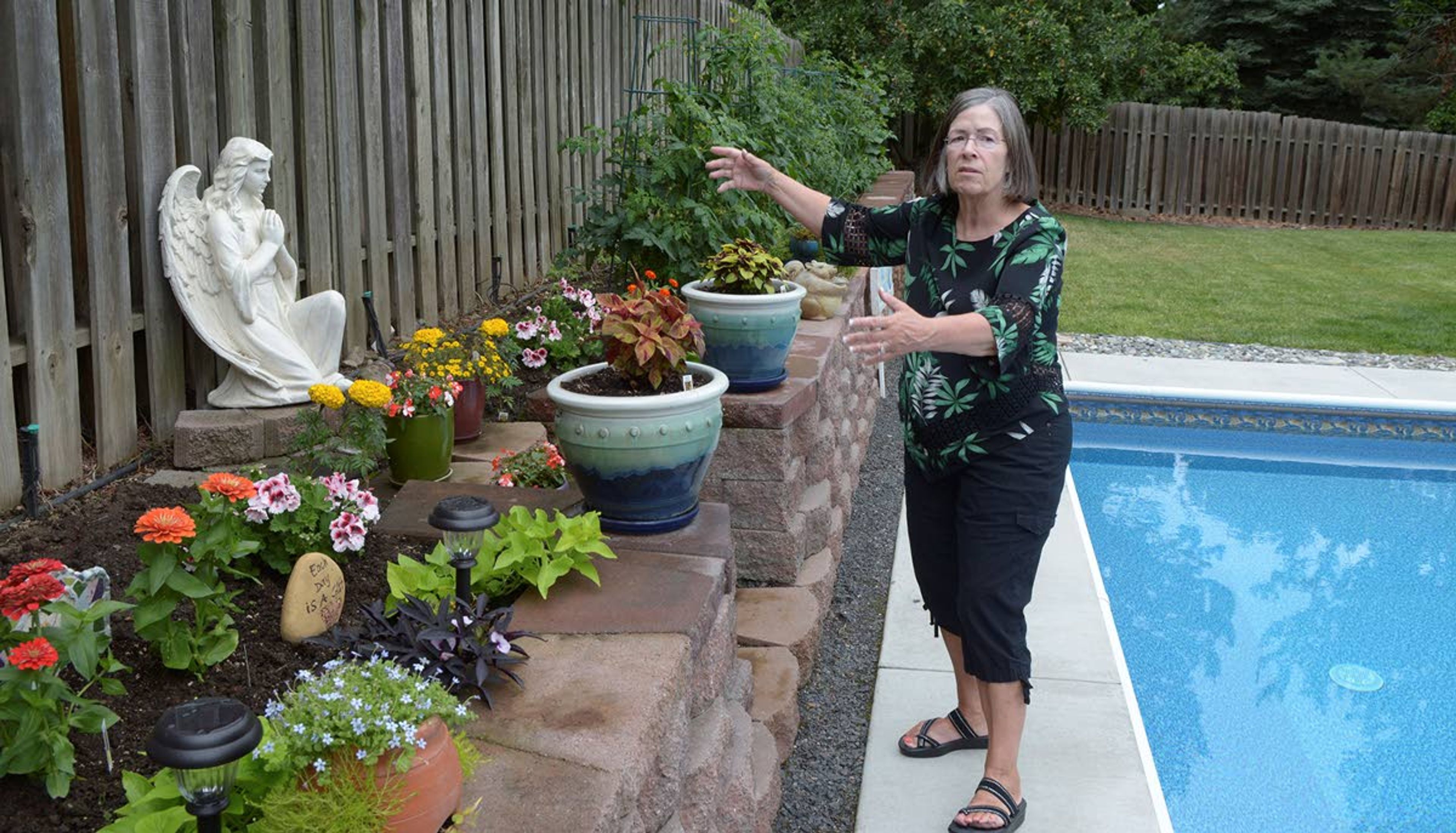 Tribune/Steve HanksRaised flower and vegetable beds ease in weeding for Lewiston’s Gale Thompson.