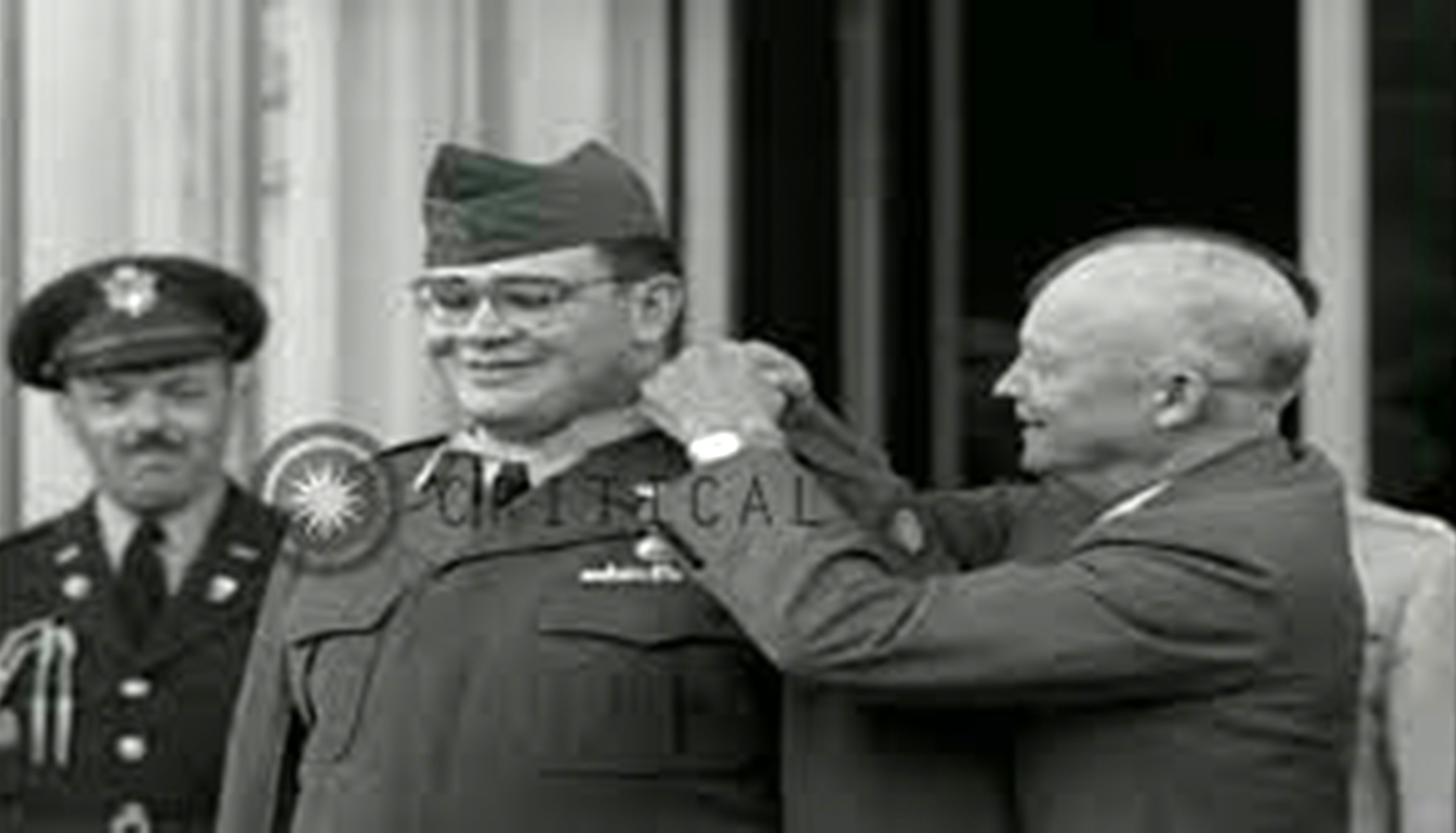 David Bruce Bleak is awarded a medal by President Dwight Eisenhower.