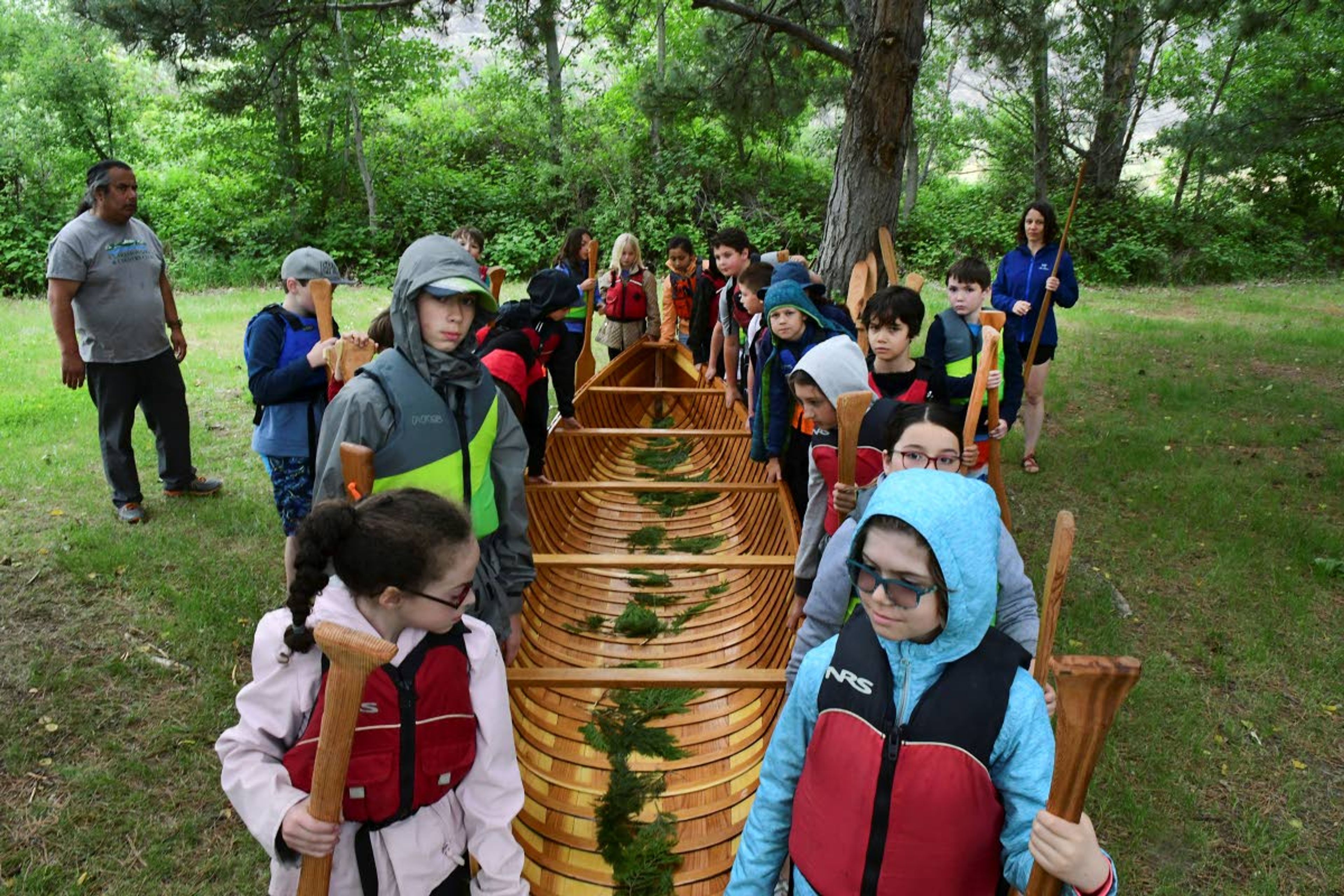 Fourth-graders from Palouse Prairie Charter School in Moscow launched a 22-foot cedar-plank canoe Friday at Chief Timothy Park on the Snake River west of Clarkston. Renee Hill’s students built the canoe at school over the past two months, with guidance from Xander Demetrious and Adam Wicks-Arshack, while they studied American Indian culture. With the help of Nez Perce Tribal members, the canoe, named the “Chinook,” was blessed Friday, then carried by all the students, and set afloat in the Snake River. The new handmade boat was paddled around Silcott Island in a light rain. It will be donated to the Nez Perce Tribe’s Nimiipuu Protecting the Environment group for teaching and regional demonstrations.