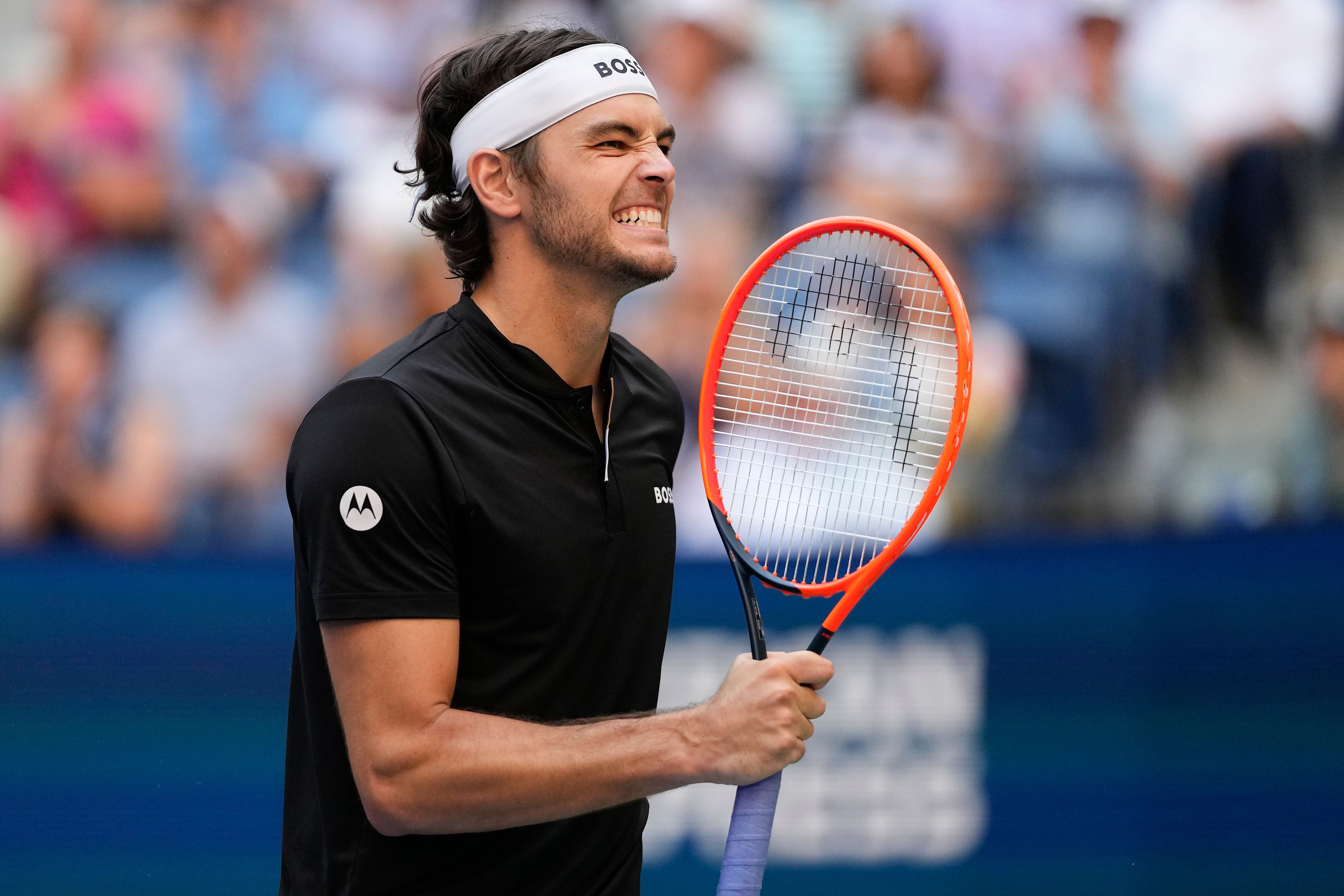 Taylor Fritz, of the United States, reacts in the fourth set against Alexander Zverev, of Germany, during the quarterfinals of the U.S. Open tennis championships, Tuesday, Sept. 3, 2024, in New York.