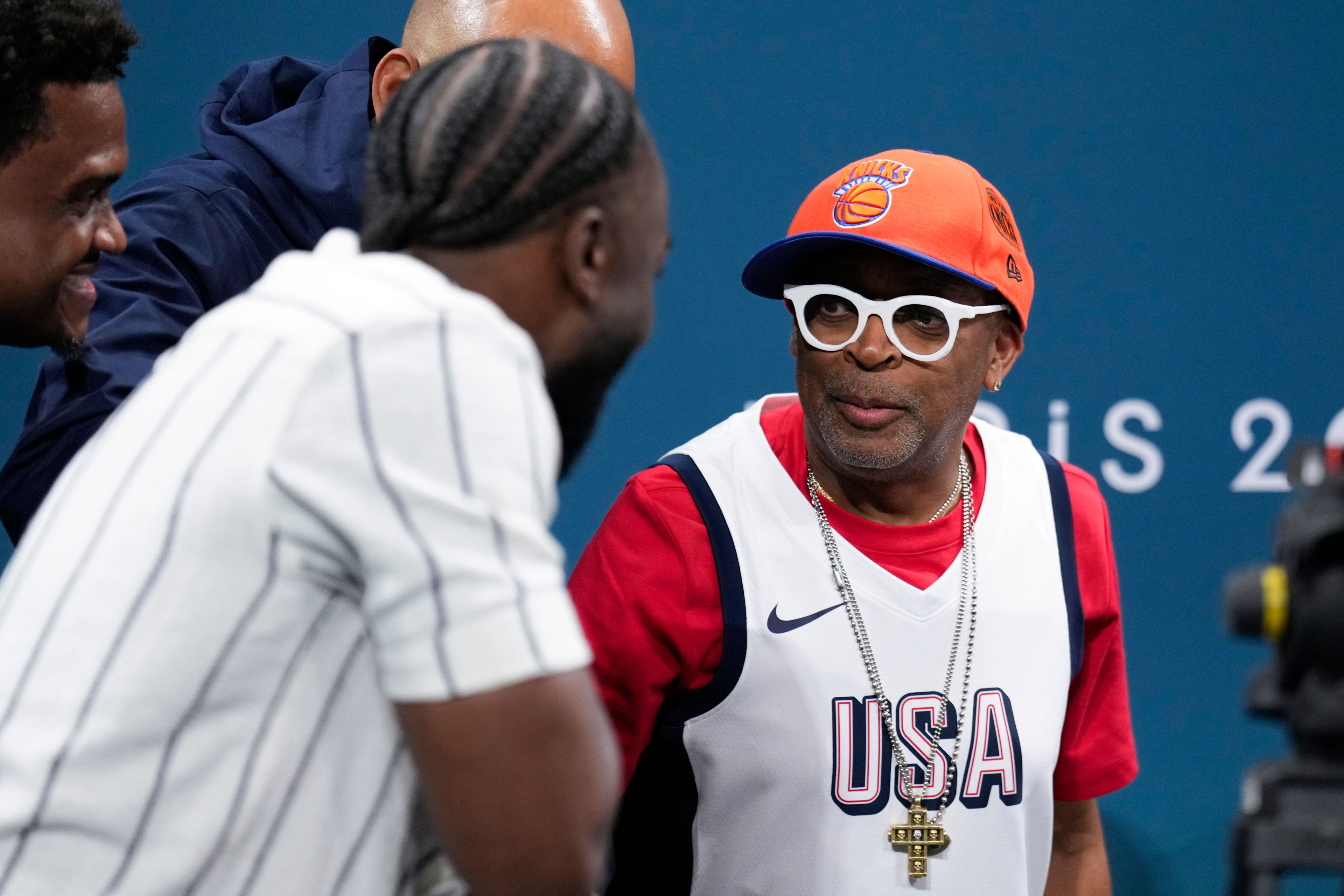 Filemaker Spike Lee is interviewed before a game between the United States and South Sudan in a men's basketball game at the 2024 Summer Olympics, Wednesday, July 31, 2024, in Villeneuve-d'Ascq, France. (AP Photo/Mark J. Terrill)