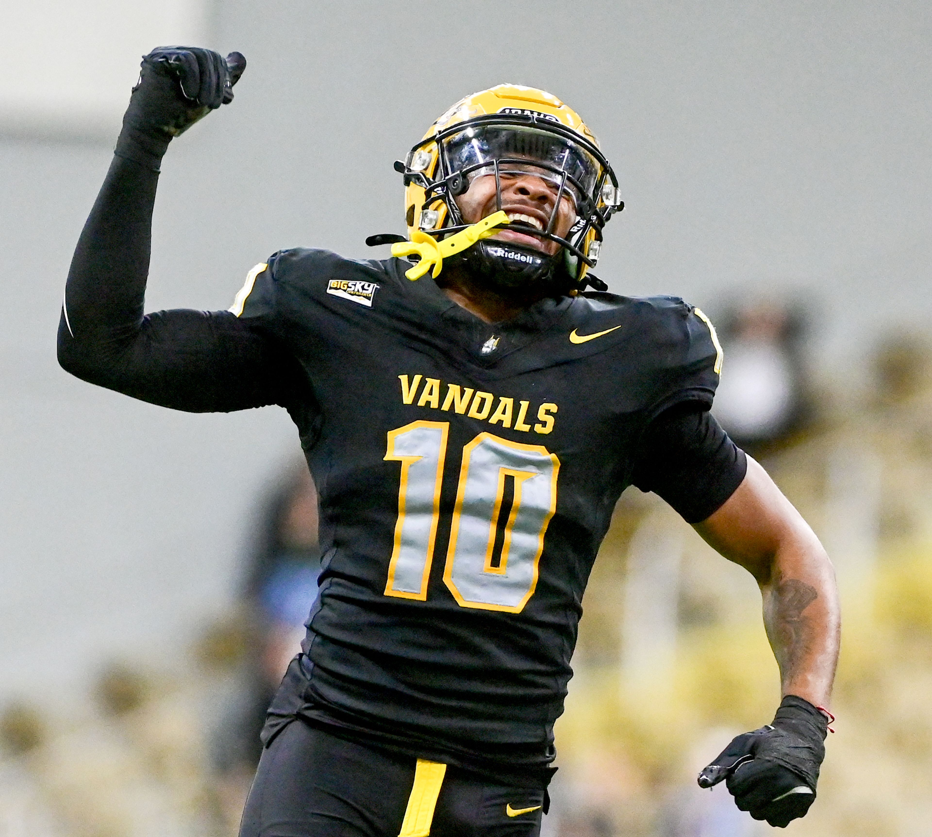 Idaho linebacker Syrr Barnes jumps in celebration of Idaho recovering a Cal Poly fumble Saturday at the P1FCU Kibbie Dome in Moscow.,