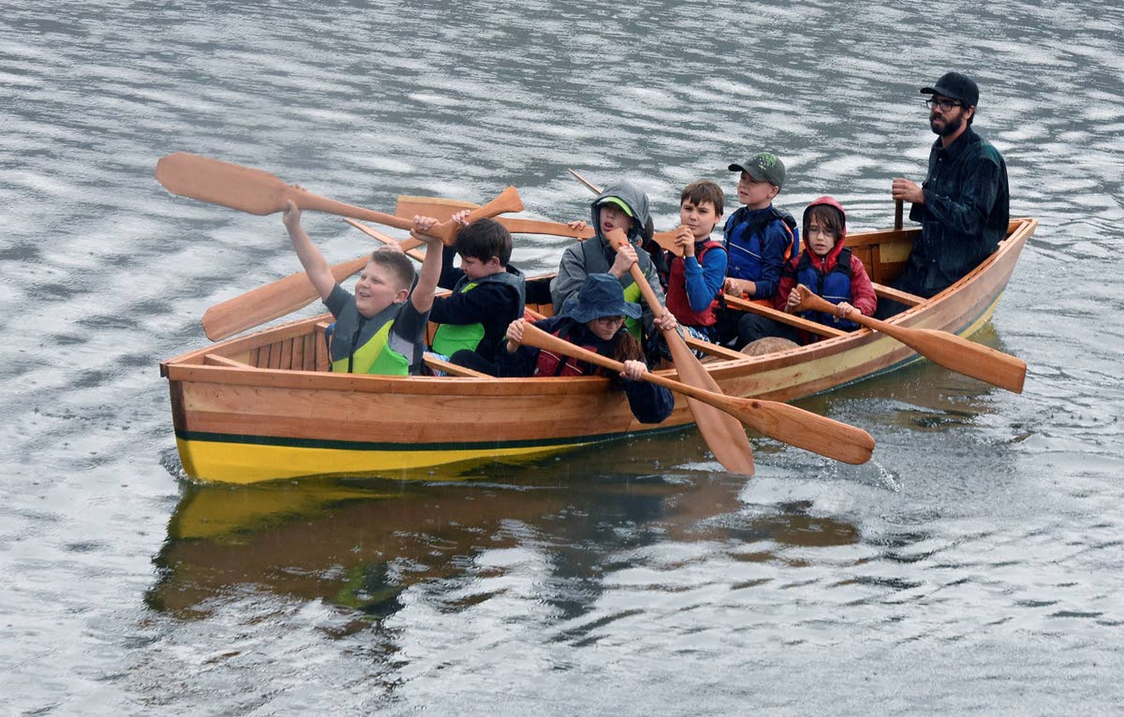 Fourth-graders from Palouse Prairie Charter School in Moscow launched a 22-foot cedar-plank canoe Friday at Chief Timothy Park on the Snake River west of Clarkston. Renee Hill's students built the canoe at school over the past two months, with guidance from Xander Demetrious and Adam Wicks-Arshack, while they studied American Indian culture. With the help of Nez Perce Tribal members, the canoe, named the "Chinook," was blessed Friday, then carried by all the students, and set afloat in the Snake River. The new handmade boat was paddled around Silcott Island in a light rain. It will be donated to the Nez Perce Tribe's Nimiipuu Protecting the Environment group for teaching and regional demonstrations.