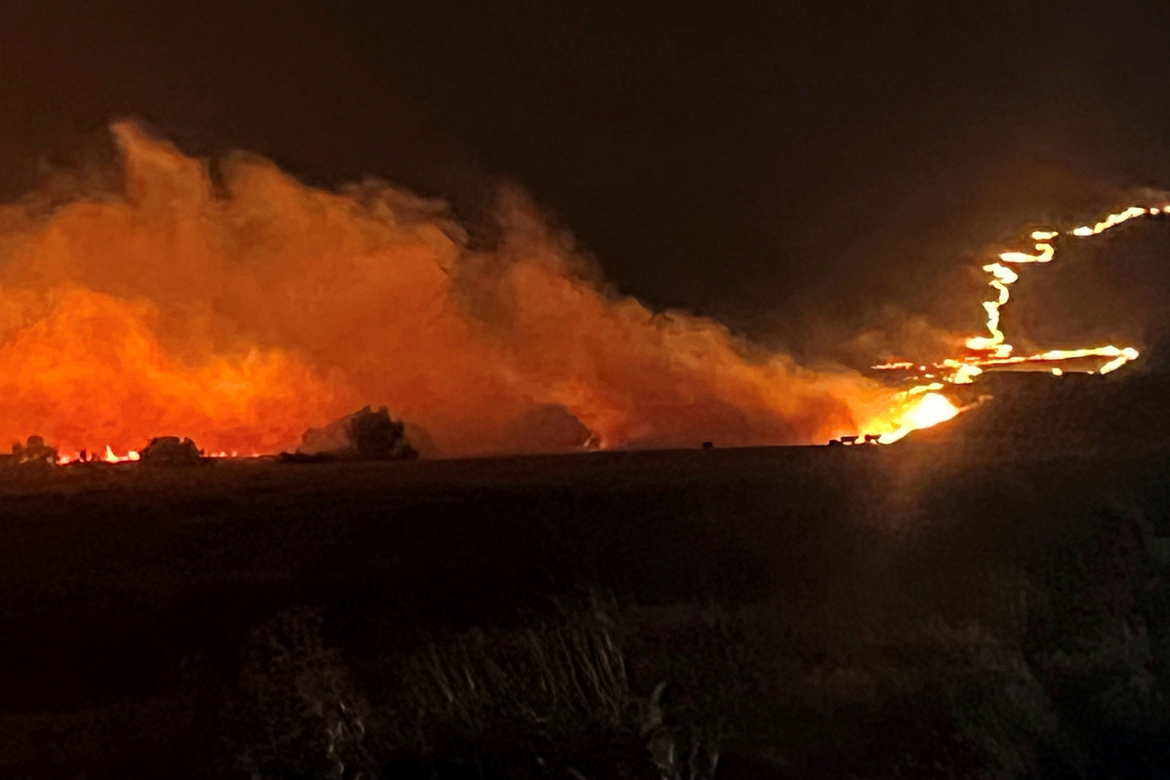 This photo provided by the Oregon Department of Transportation shows the Durkee Fire burning in eastern Ore., Monday, July 22, 2024. (Oregon Department of Transportation via AP)