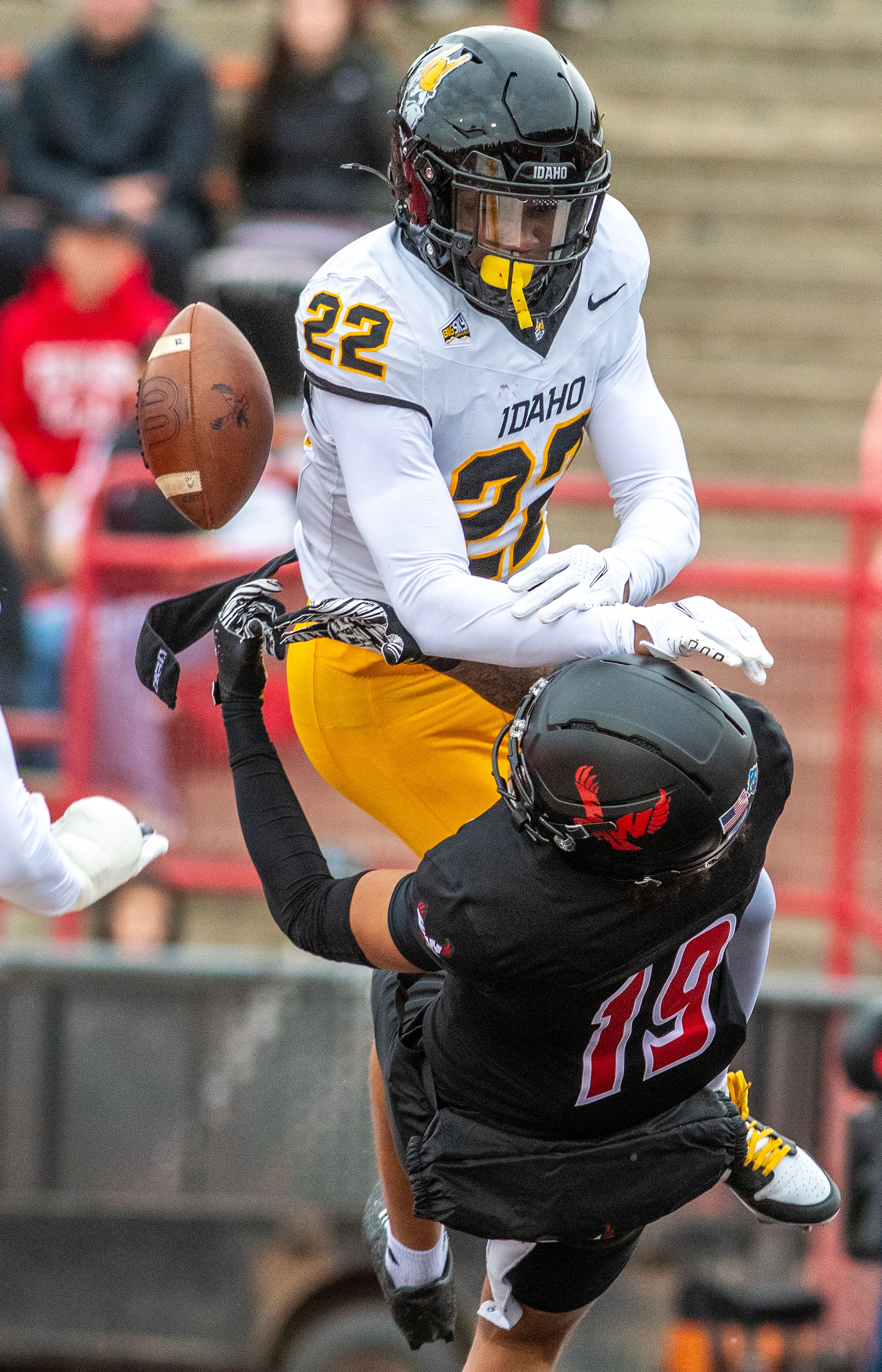 Idaho defensive back Caleb Ricks breaks up a pass intended for Eastern Washington wide receiver Jaxon Branch Saturday during a Big Sky game at Roos Field in Cheney.
