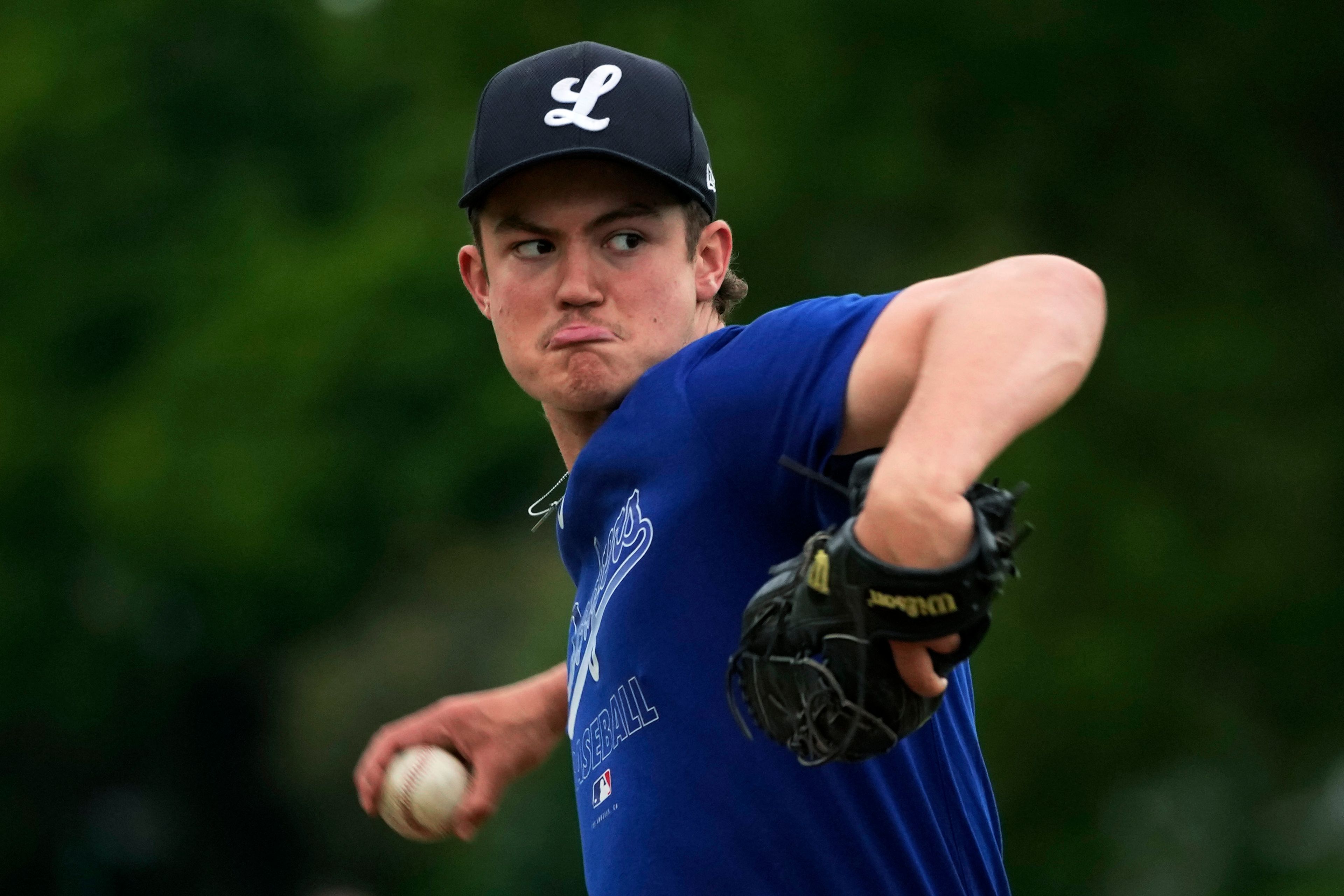 A member of the UK baseball team London Mets practices during a training session at the Finsbury Park in London, Thursday, May 16, 2024. Baseball at the highest club level in Britain is competitive. Teams are mélange of locals and expats some with college and minor league experience.