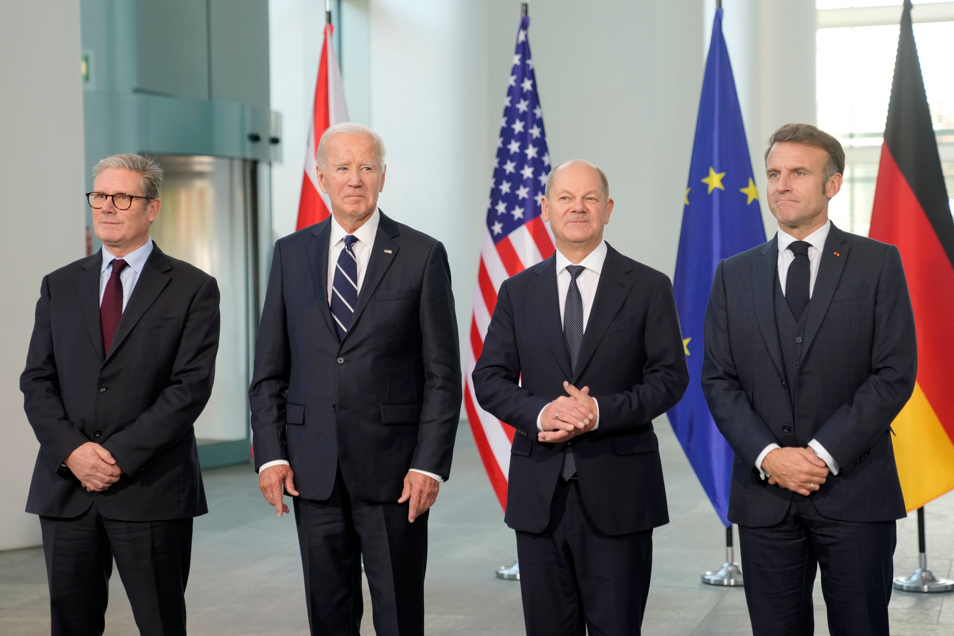 Prime Minister Keir Starmer of the United Kingdom, US President Joe Biden, Chancellor Olaf Scholz of Germany, and President Emmanuel Macron of France, from left, standing together for a Family photo during a meeting at the Chancellery in Berlin, Germany, Friday, Oct. 18, 2024. (AP Photo/Markus Schreiber)