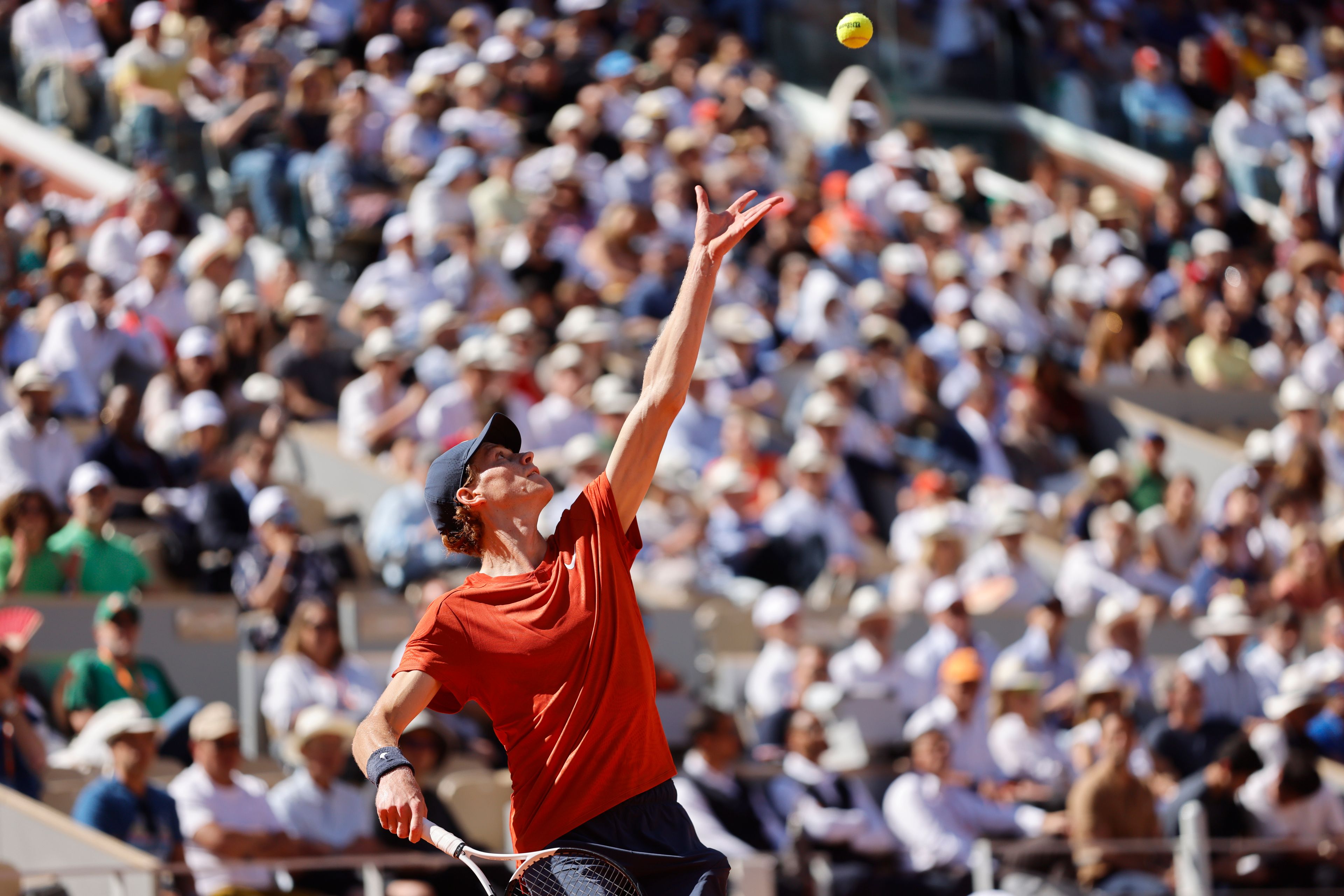 Italy's Jannik Sinner serves against Spain's Carlos Alcaraz during their semifinal match of the French Open tennis tournament at the Roland Garros stadium in Paris, Friday, June 7, 2024.