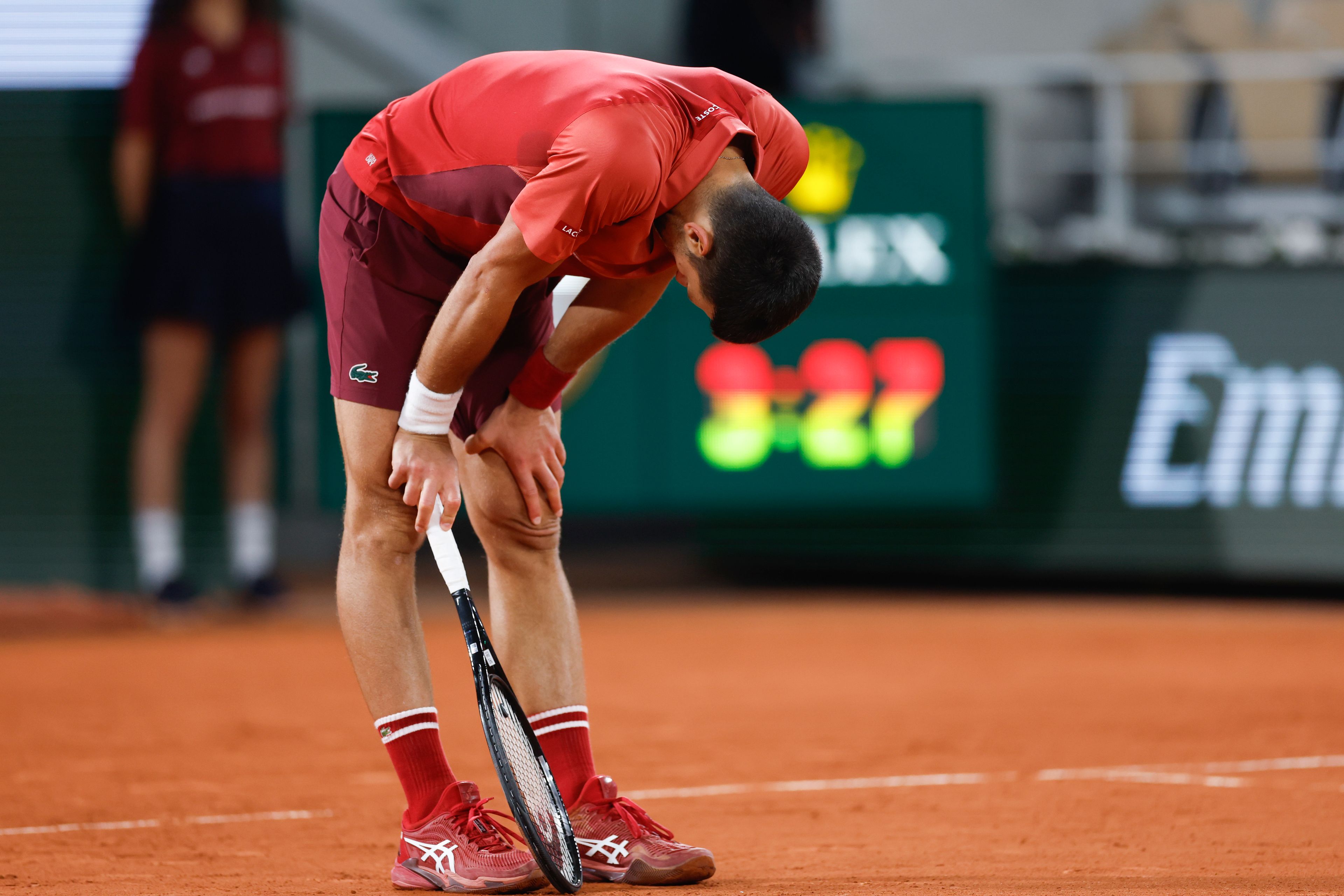 Serbia's Novak Djokovic reacts after missing a shot against Italy's Lorenzo Musetti during their third round match of the French Open tennis tournament at the Roland Garros stadium in Paris, Sunday, June 2, 2024.