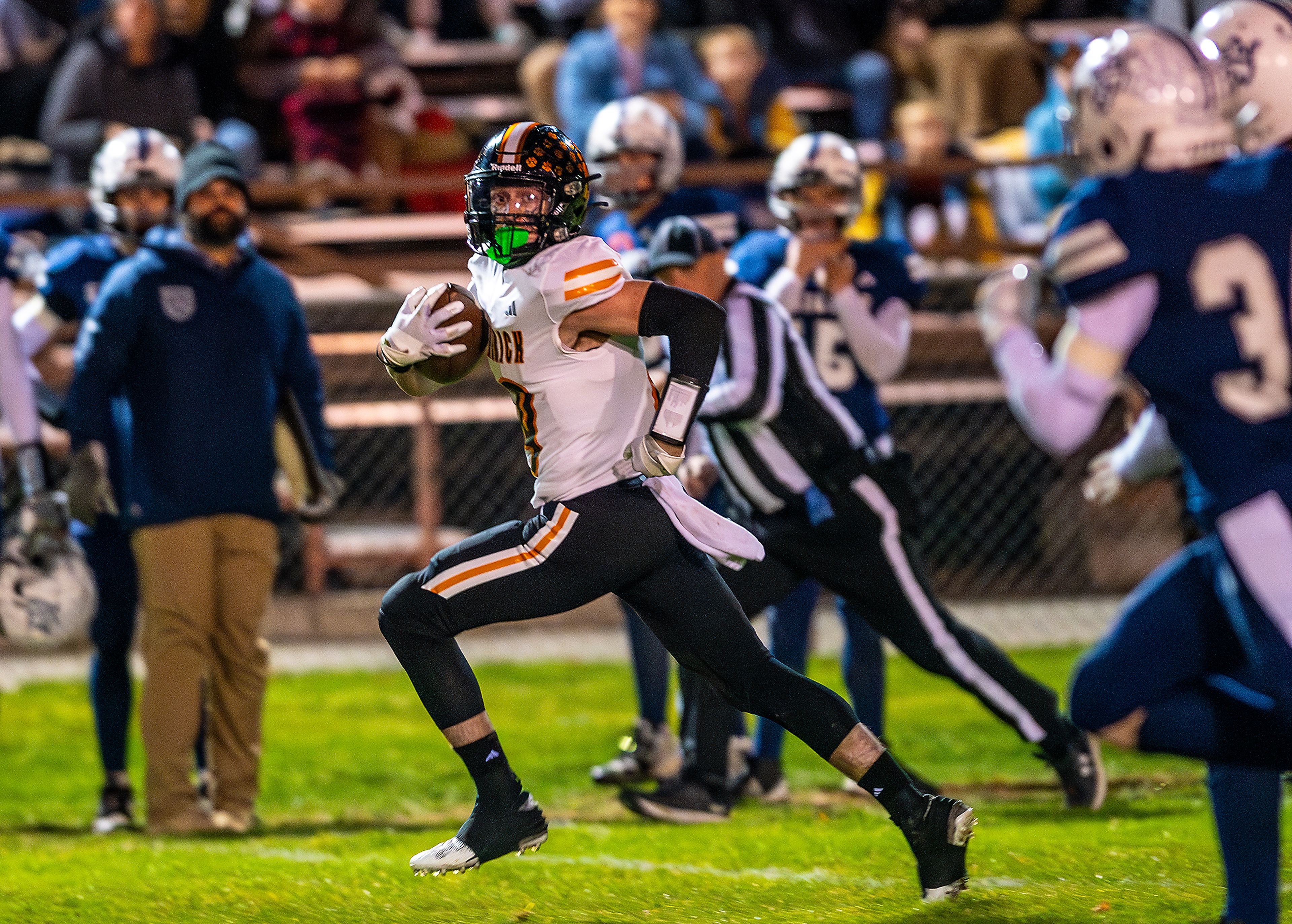 Kendrick running back Sawyer Hewett returns a kickoff for a touchdown against Logos in a semifinal game of the Idaho State Football Class 2A Championships Friday at Bengal Field in Lewiston.