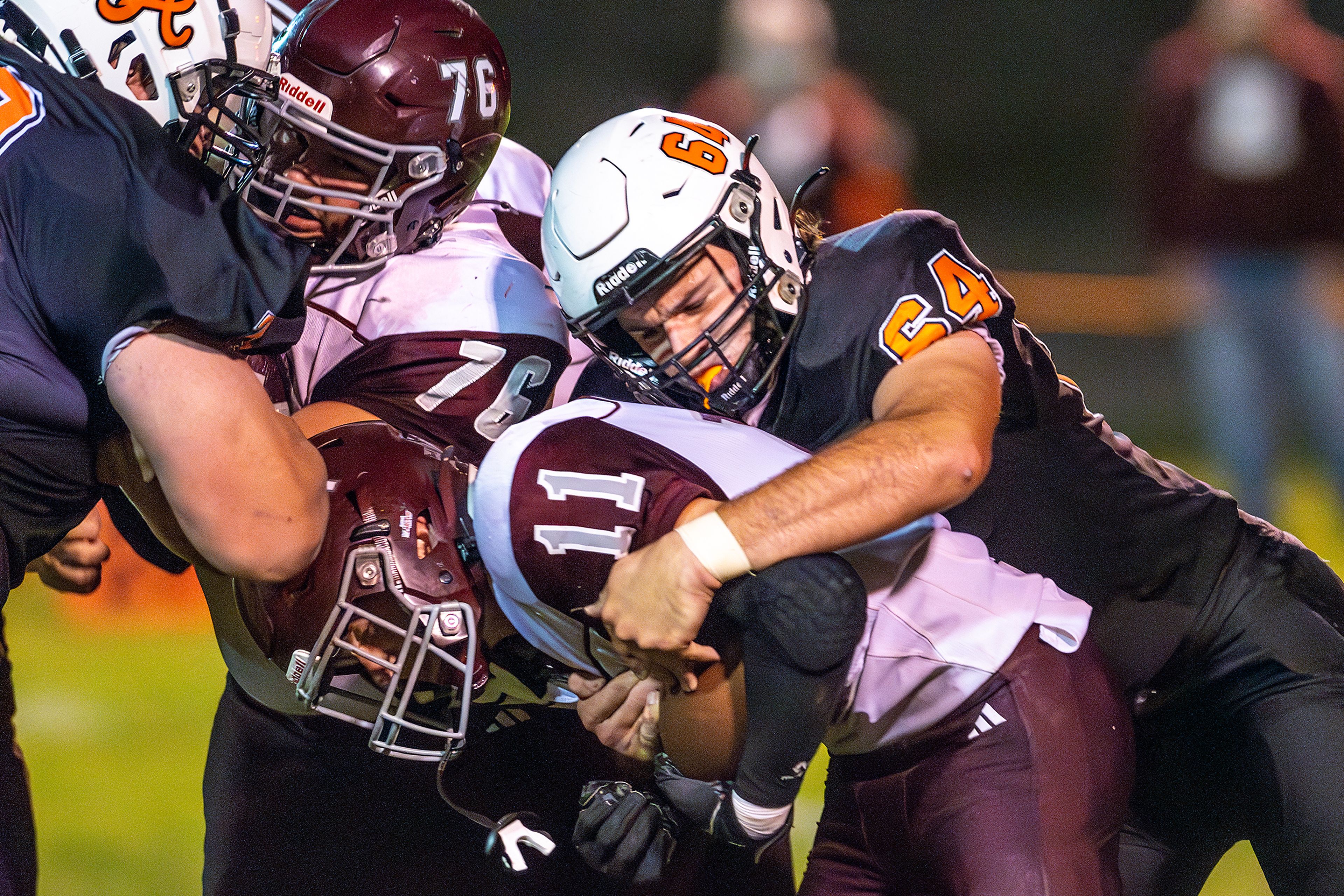 Asotin defensive lineman AJ Olerich tackles Reardan�s Zander Thornton during a Northeast 2B League game Friday in Asotin.,