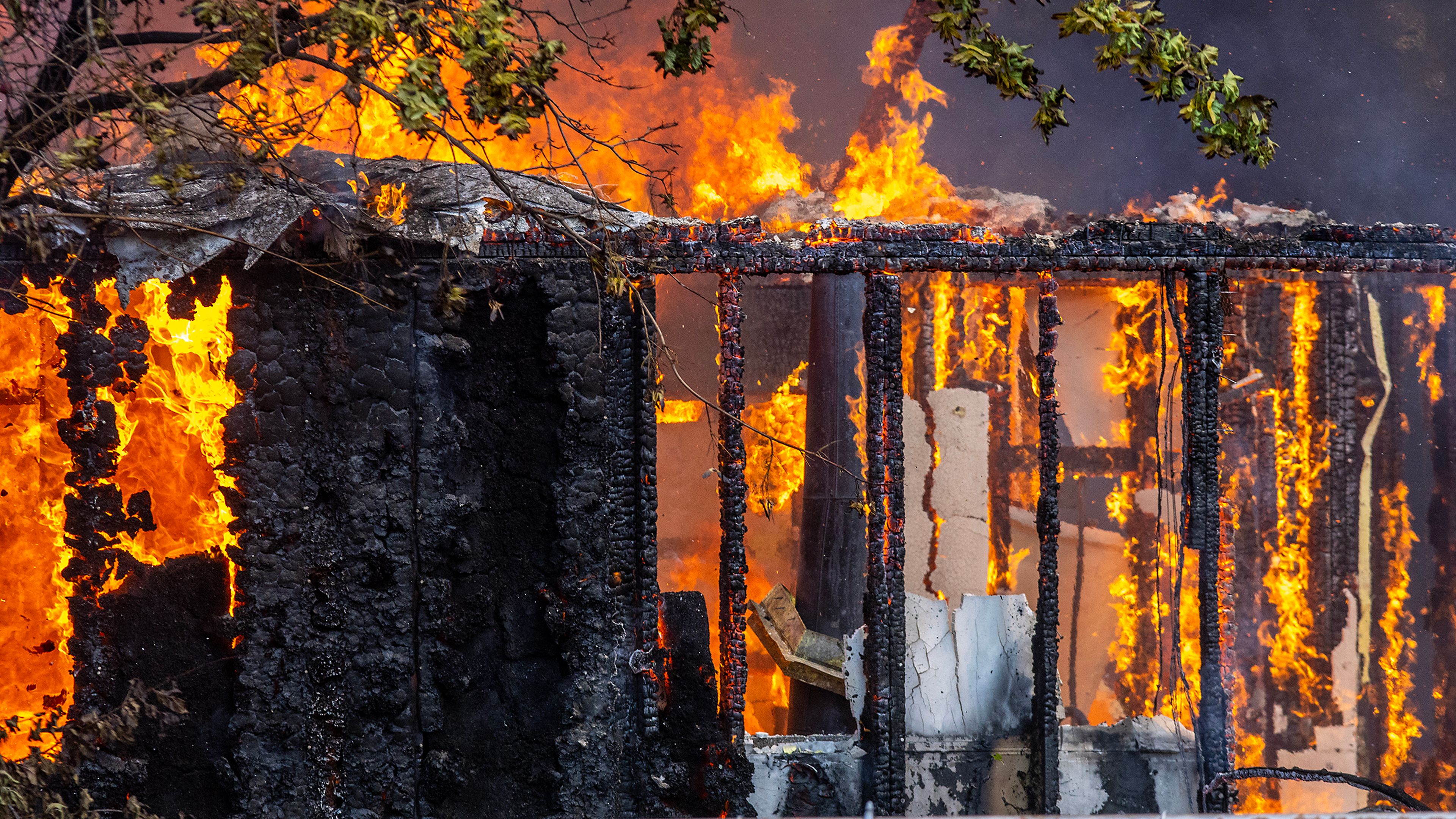 A structure fire burns Friday on Lolo Street in Lapwai.