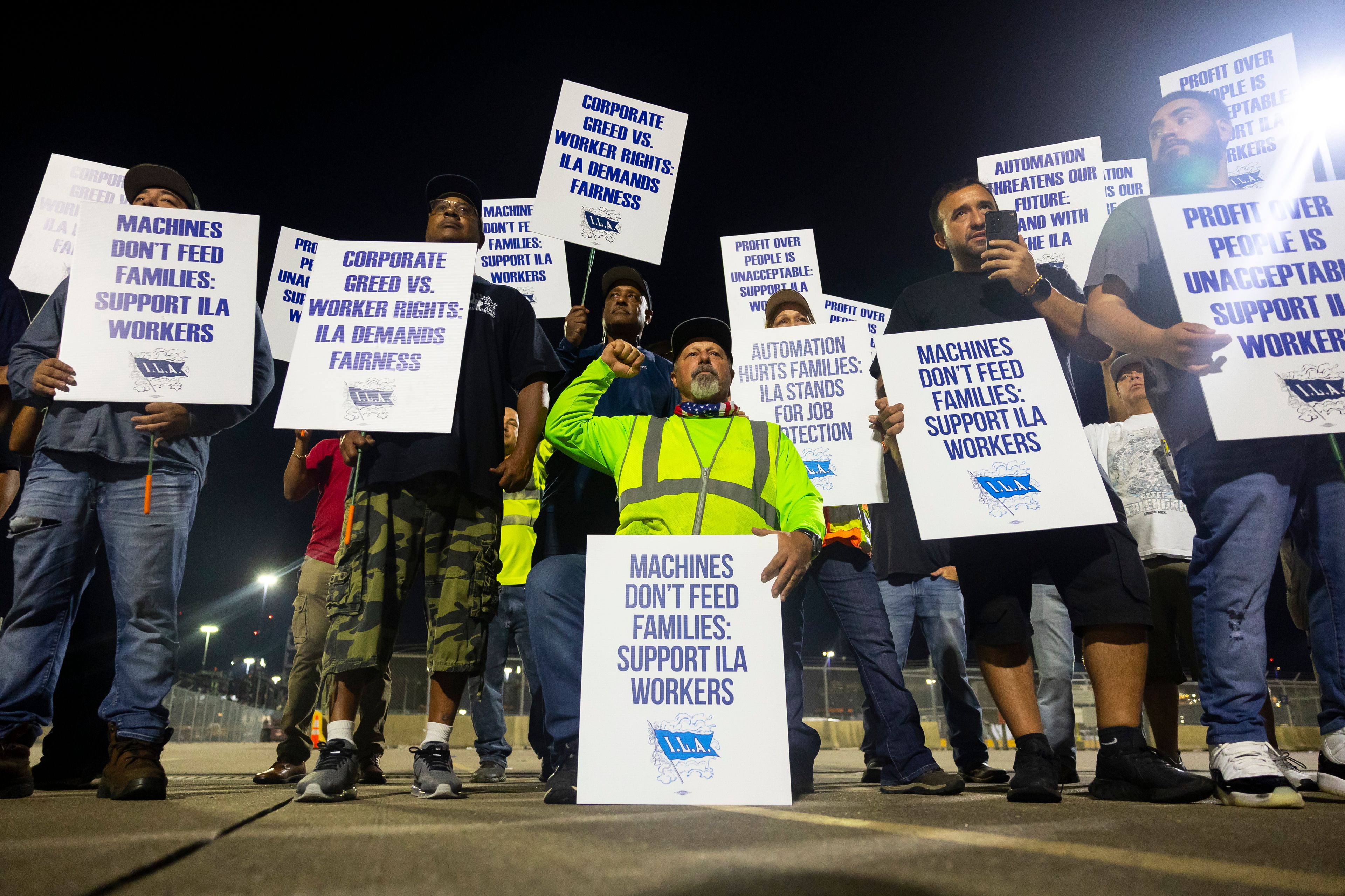 Longshoremen strike at midnight at Bayport Terminal on Tuesday, Oct. 1, 2024, in Houston. (AP Photo/Annie Mulligan)