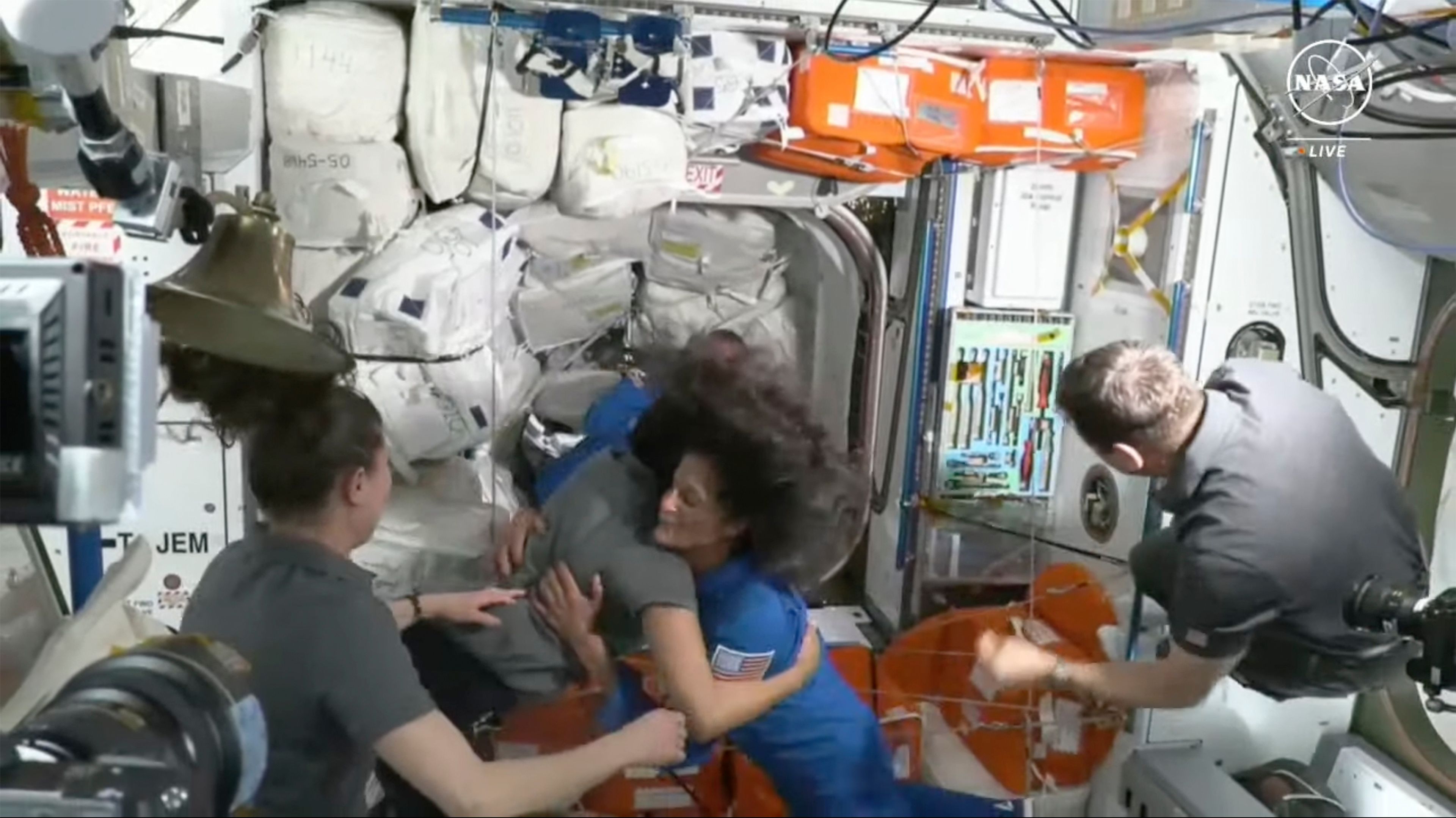 NASA astronauts Butch Wilmore and Suni Williams are greeted by the crew of the International Space Station on Thursday, June 6, 2024.