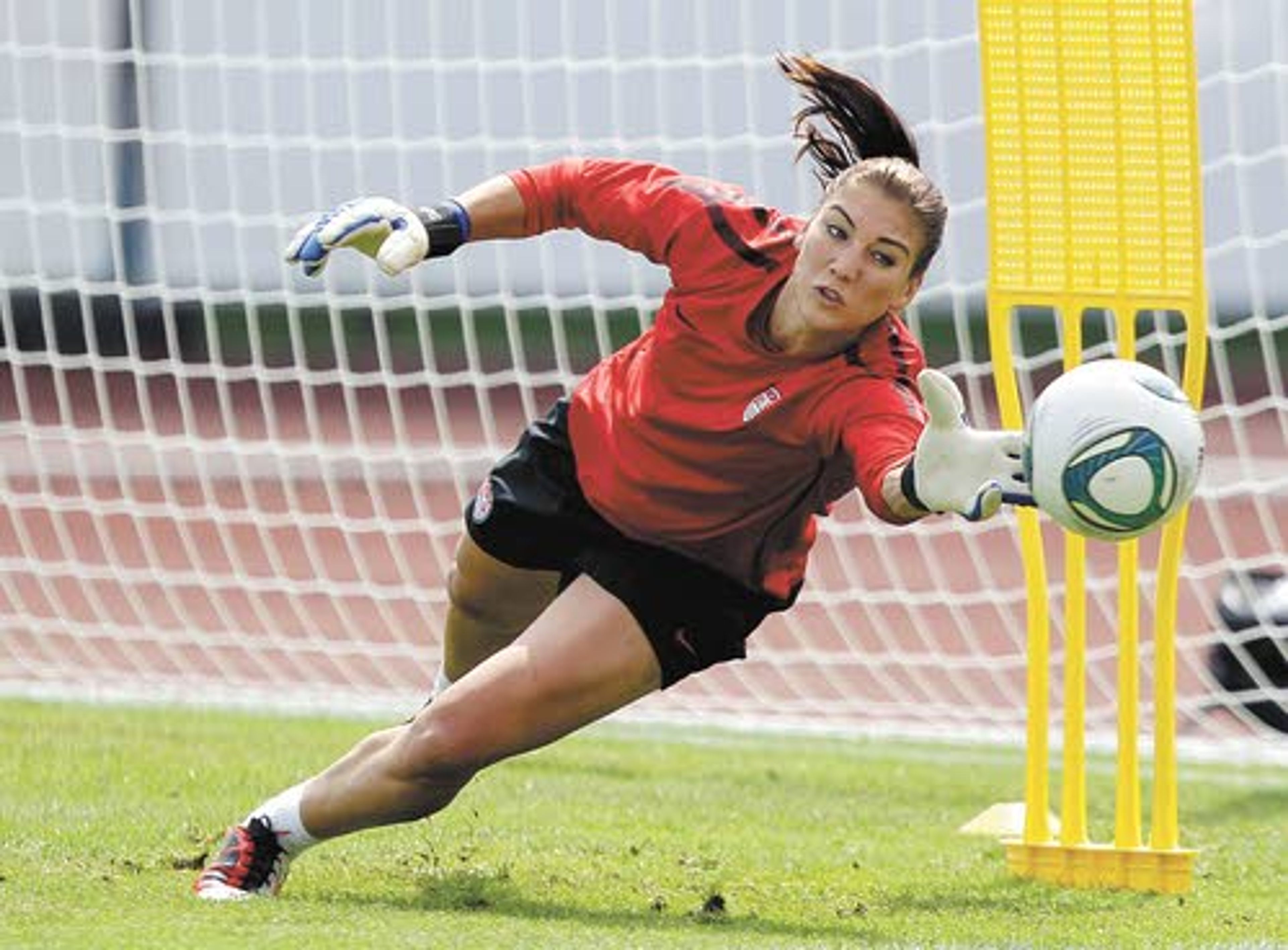 United States goalkeeper Hope Solo makes a save during a
training session in preparation for the World Cup title match.