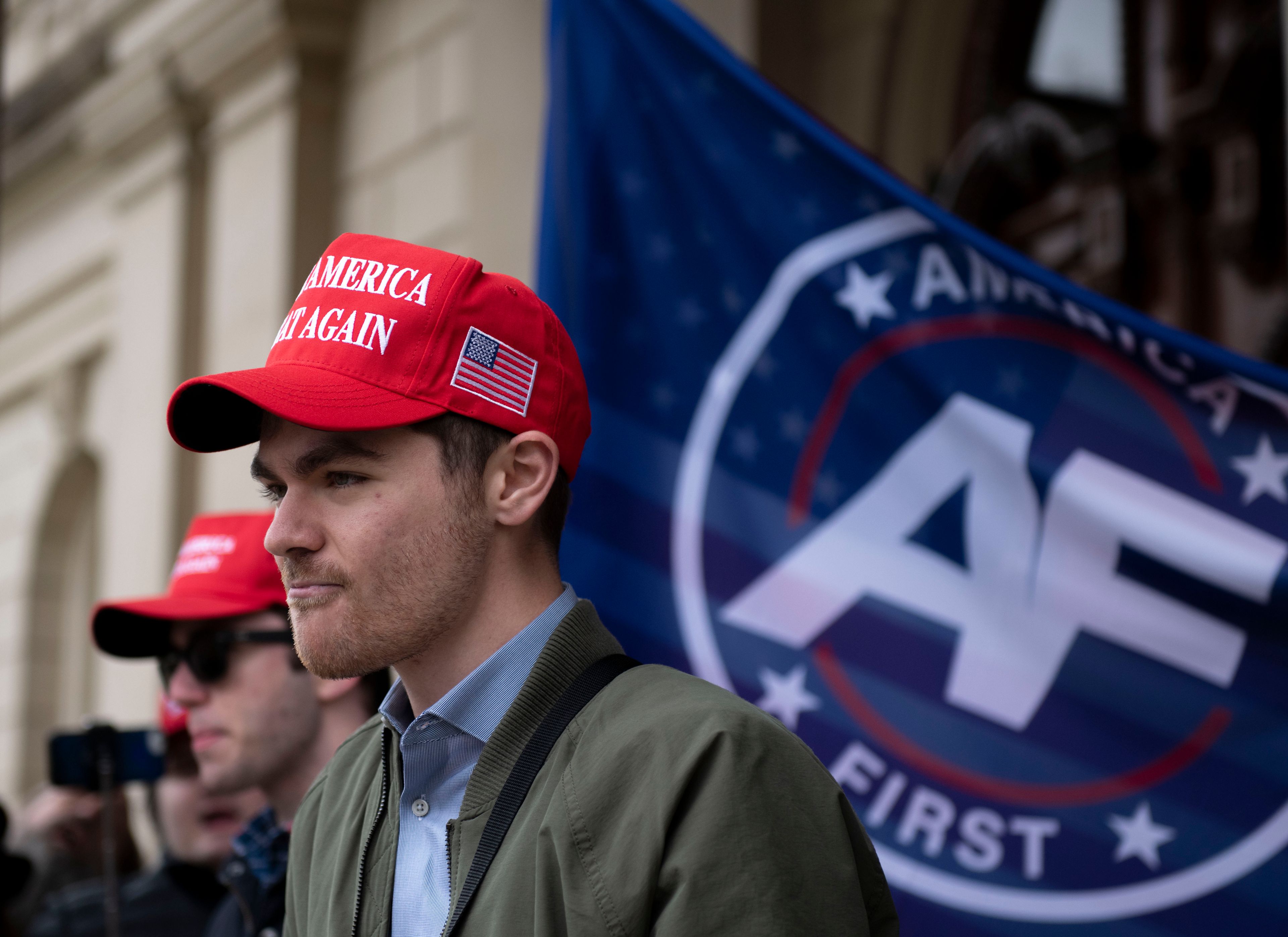 FILE - Nick Fuentes, far-right activist, holds a rally at the Lansing Capitol, in Lansing, Mich., Nov. 11, 2020. Former President Donald Trump had dinner Tuesday, Nov. 22, 2022, at his Mar-a-Lago club with the rapper formerly known as Kanye West, who is now known as Ye, as well as Nick Fuentes, who has used his online platform to spew antisemitic and white supremacist rhetoric. (Nicole Hester/Ann Arbor News via AP, File)