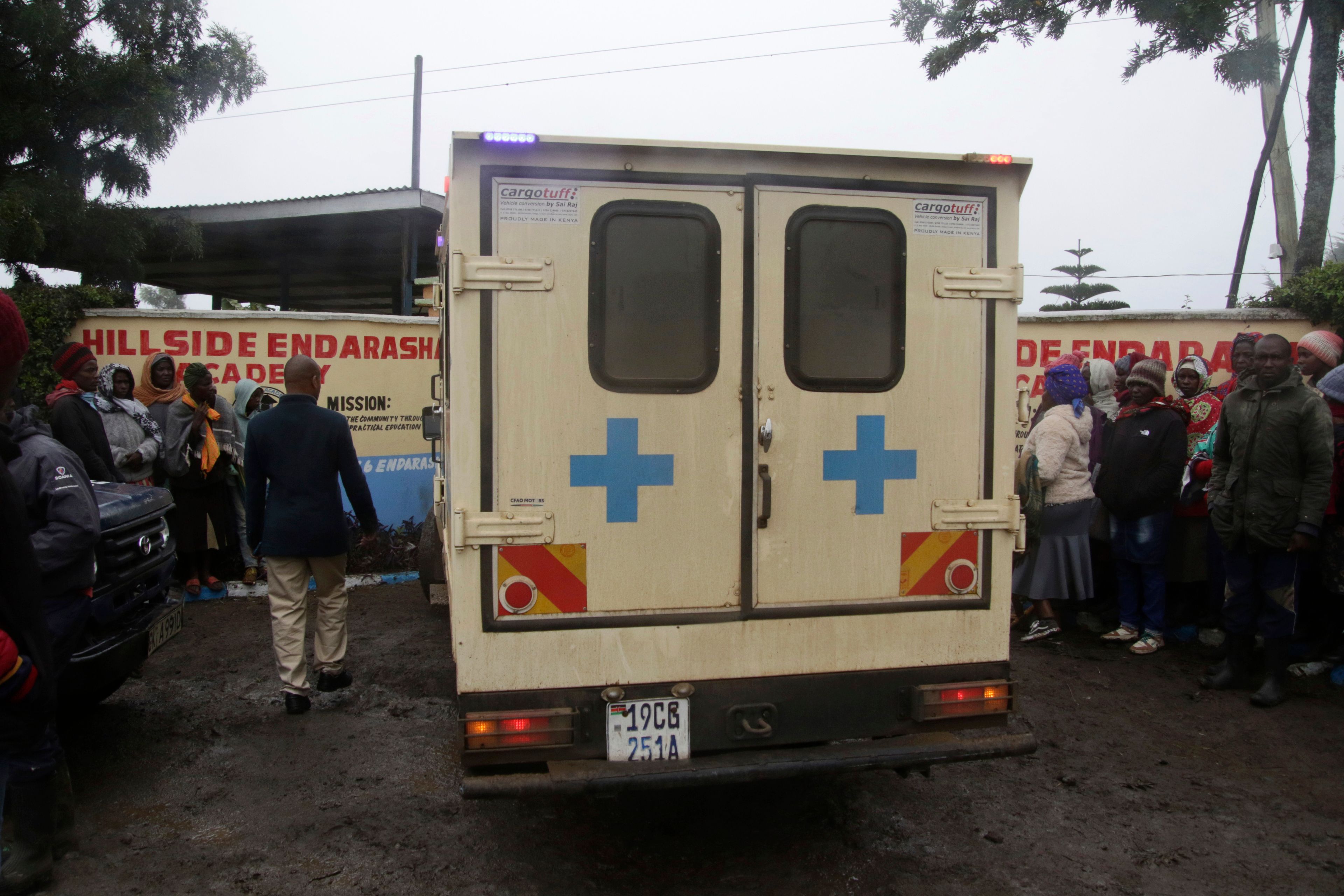 An ambulance drives inside the Hillside Endarasha Primary school following a fire incident in Nyeri, Kenya Friday, Sep. 6, 2024.