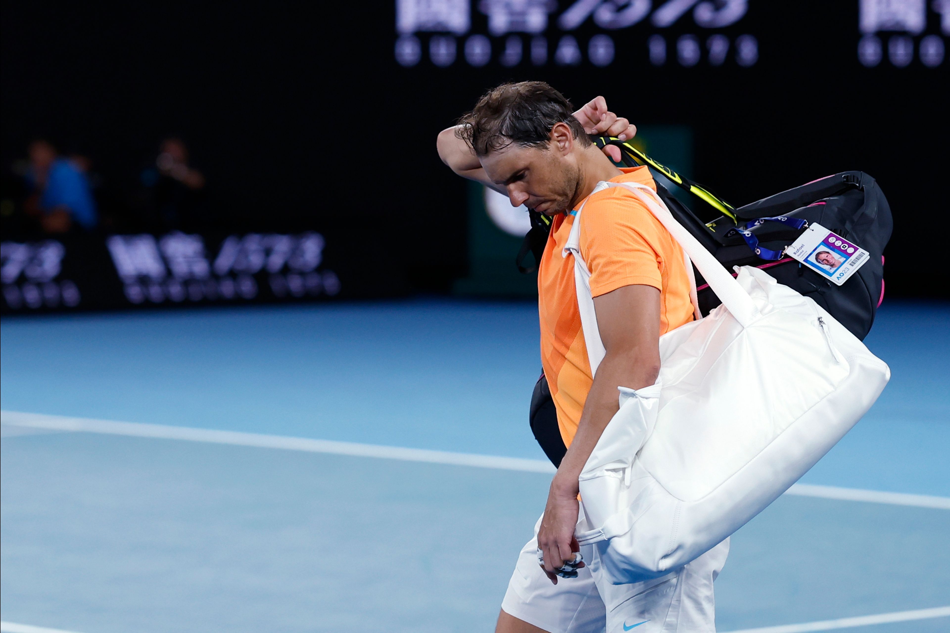 Rafael Nadal of Spain leaves Rod Laver Arena following his second round loss to Mackenzie McDonald of the U.S. at the Australian Open tennis championship in Melbourne, Australia, Wednesday, Jan. 18, 2023. (AP Photo/Asanka Brendon Ratnayake)