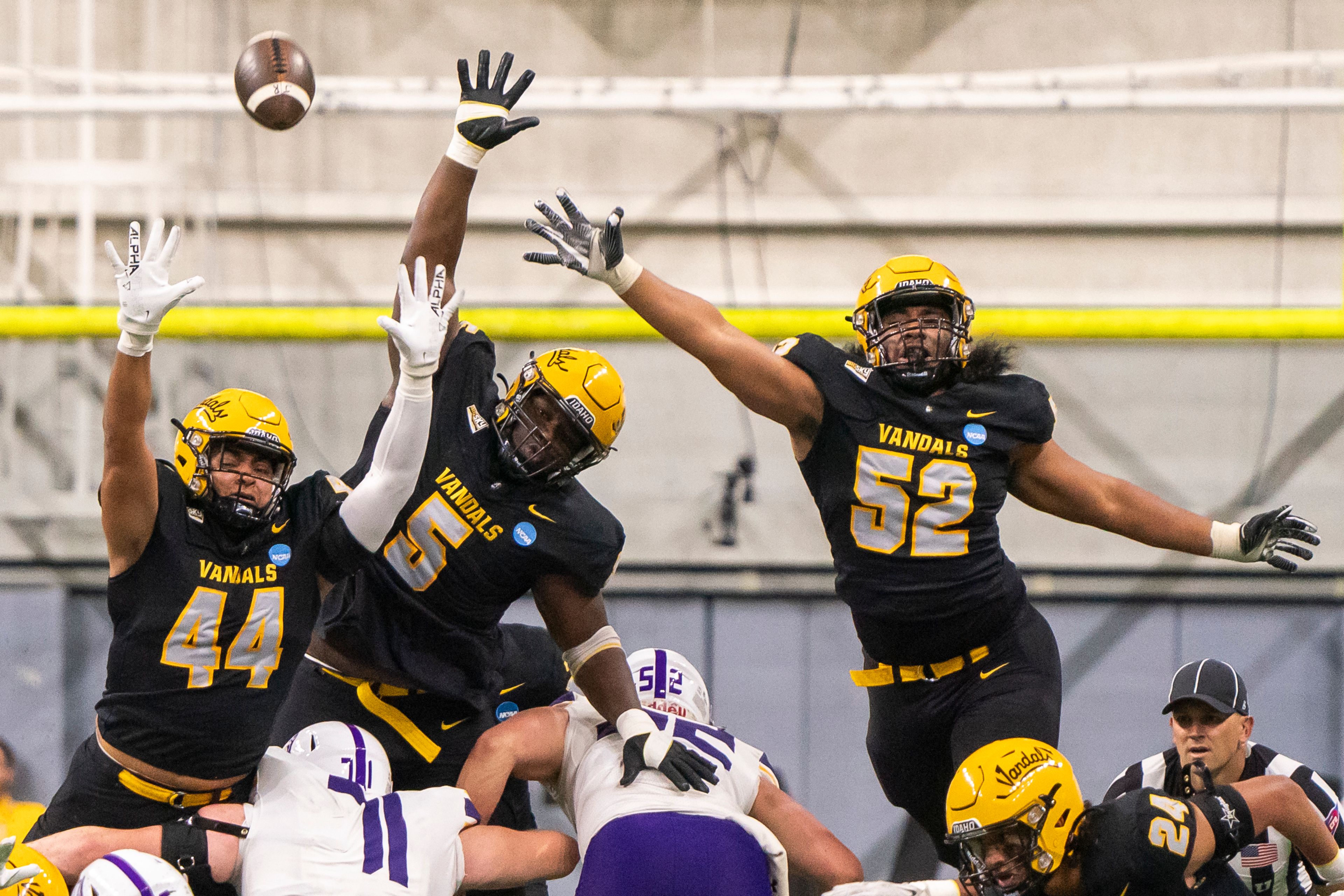 Idaho Vandals defensive lineman Keyshawn James-Newby (44), linebacker Jahkari Larmond (5) and defensive lineman Dallas Afalava (52) attempt to block a field goal attempt during their game against Albany in the third round of the 2023 Division I FCS Football Championship on Saturday inside the Kibbie Dome in Moscow. 