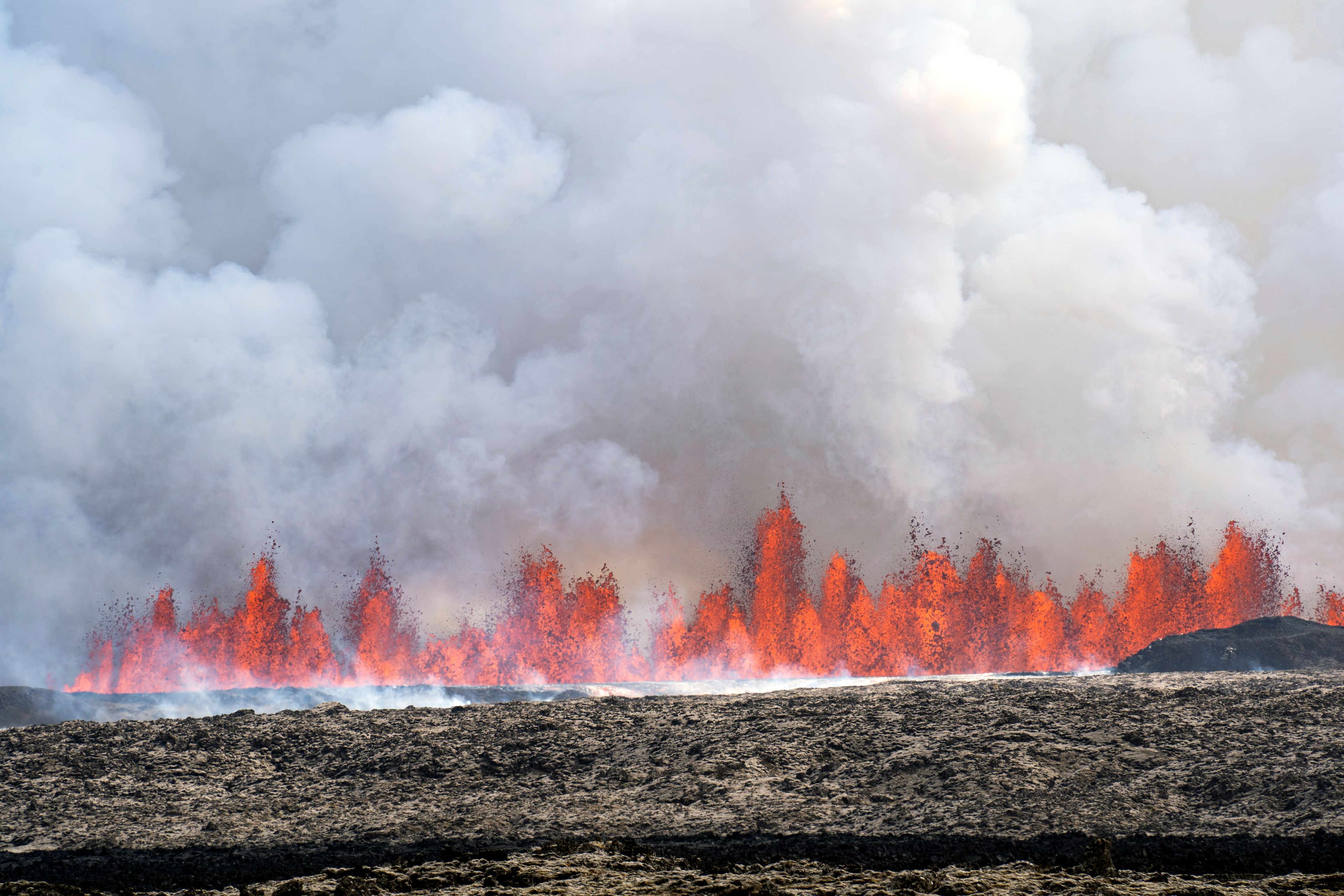 A volcano spews lava in Grindavik, Iceland, Wednesday, May 29, 204. Wednesday, May 29, 2024. A volcano in southwestern Iceland is erupting, spewing red streams of lava in its latest display of nature's power. A series of earthquakes before the eruption Wednesday triggered the evacuation of the popular Blue Lagoon geothermal spa. The eruption began in the early afternoon north of Grindavik, a coastal town of 3,800 people that was also evacuated.