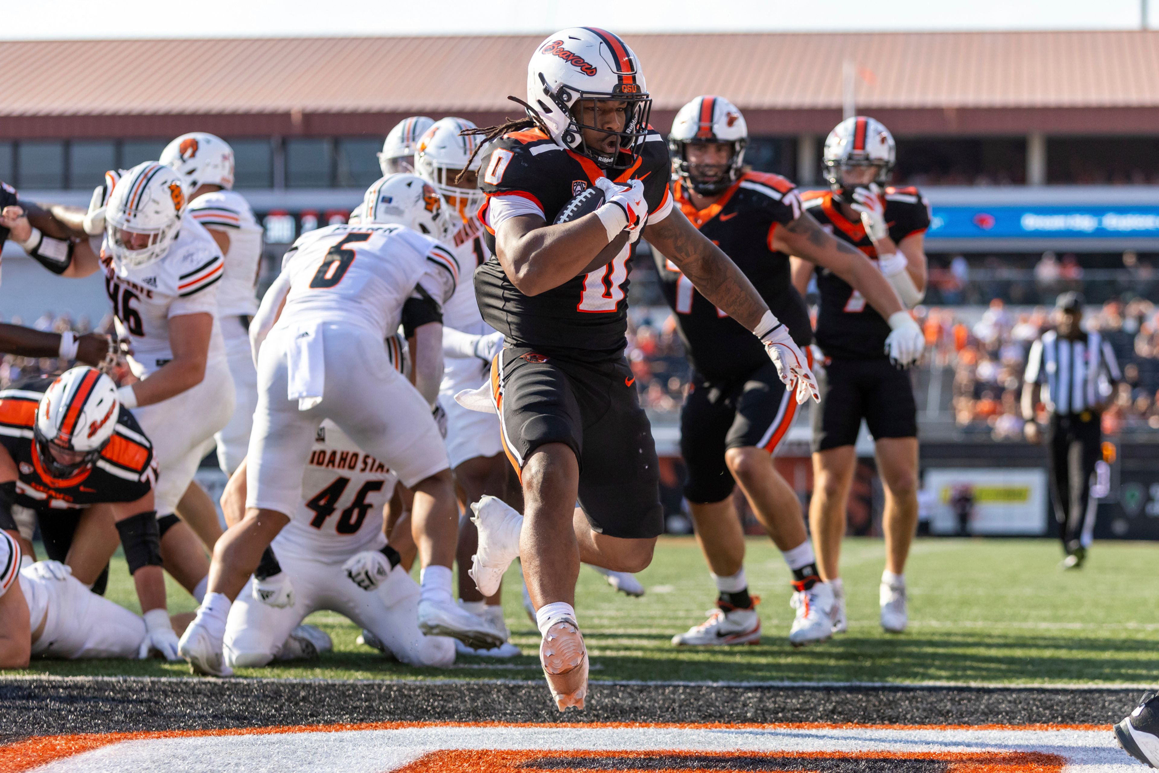 Oregon State running back Anthony Hankerson (0) finds the end zone for a touchdown during an NCAA college football game against Idaho State in Corvallis, Ore., Saturday, Aug. 31, 2024. (Sean Meagher/The Oregonian via AP)