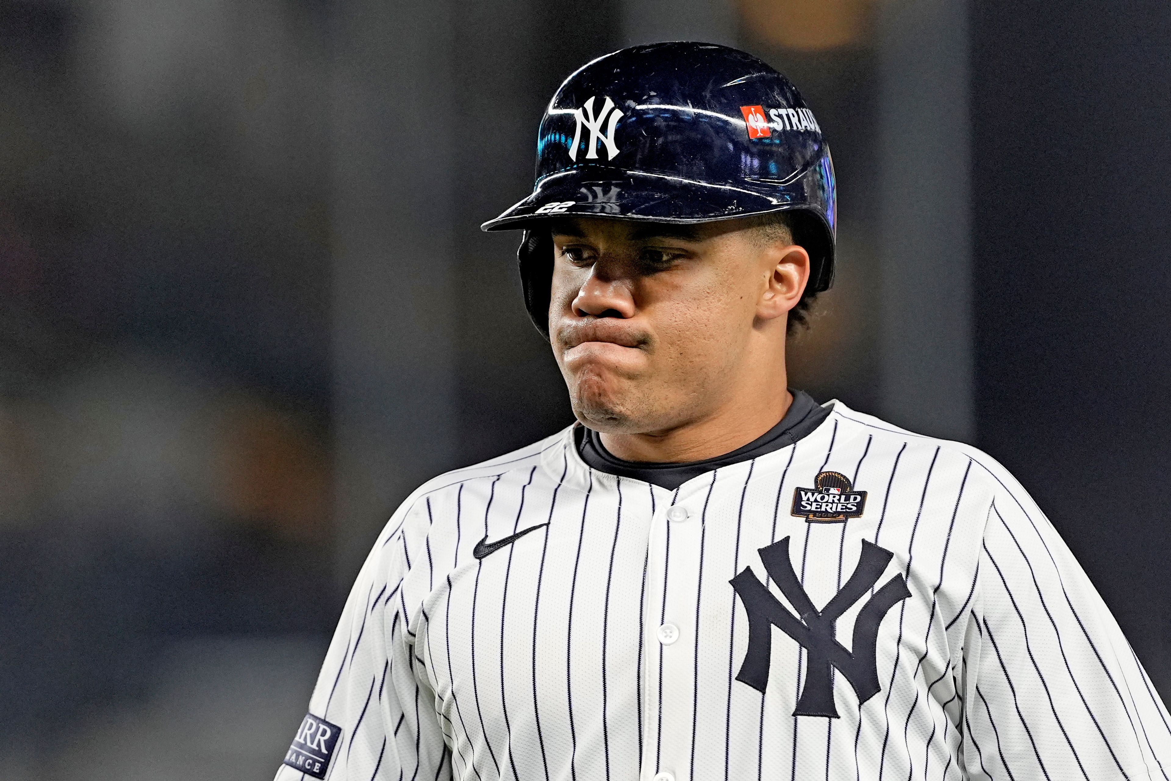 New York Yankees' Juan Soto reacts after flying out against the Los Angeles Dodgers during the eighth inning in Game 3 of the baseball World Series, Monday, Oct. 28, 2024, in New York. (AP Photo/Godofredo A. Vásquez)