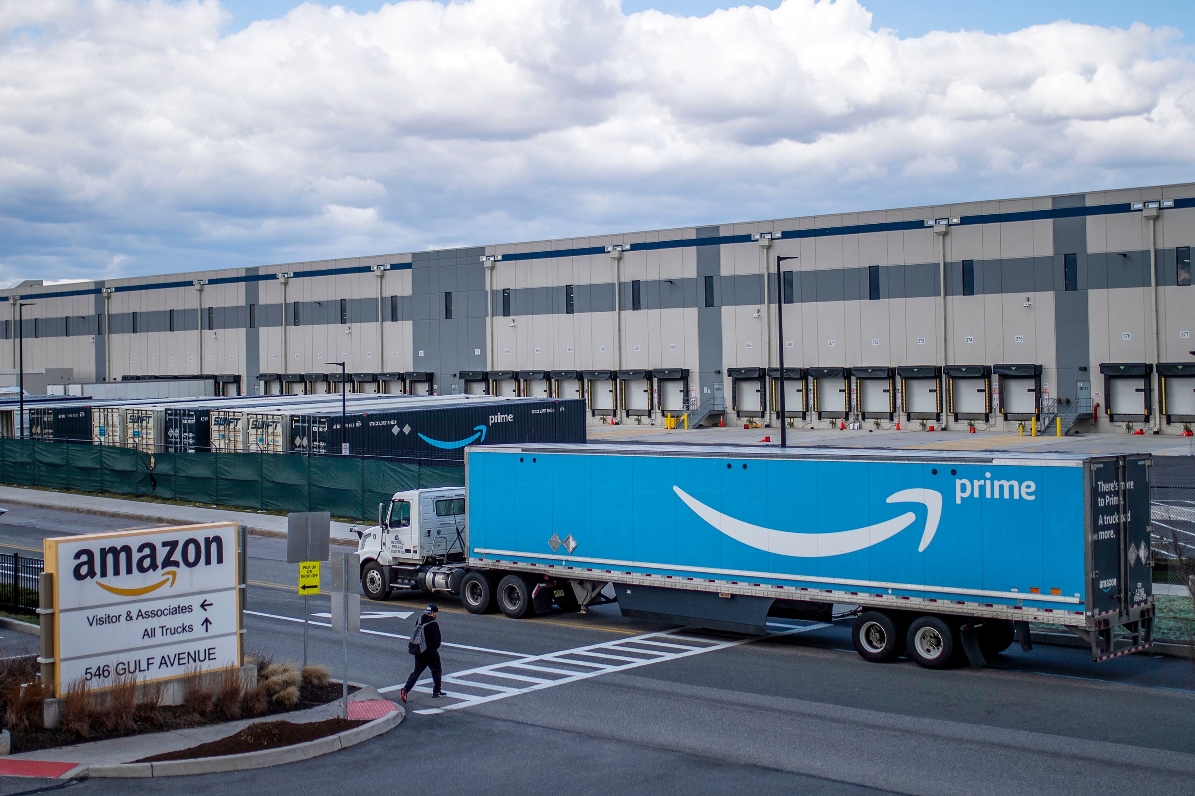 FILE - A truck arrives at the Amazon warehouse facility, in the Staten Island borough of New York, April 1, 2022. A real estate developer is wanting to build a distribution center near the Moscow-Pullman Highway on the east end of Pullman.