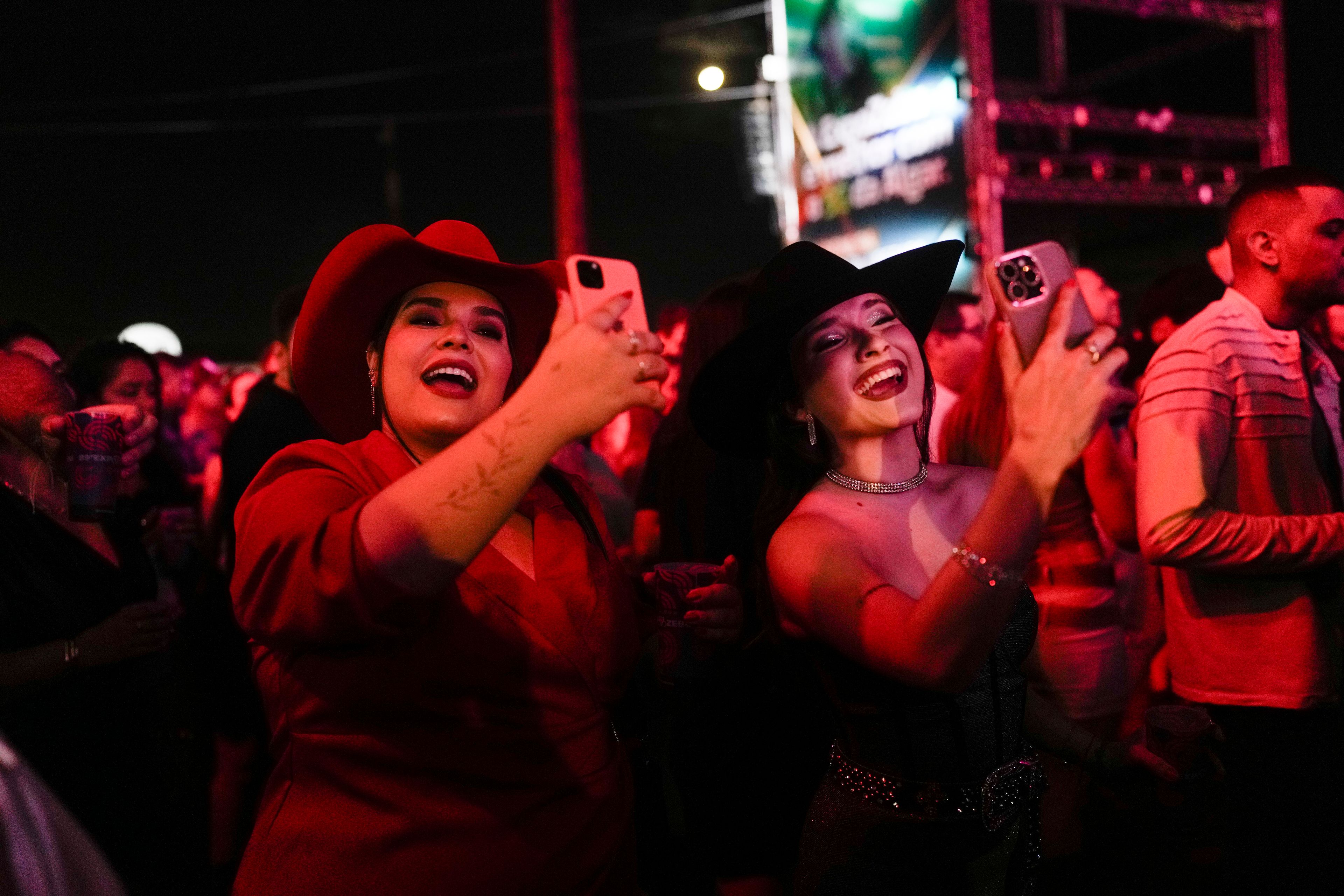 Spectators attend a concert at the ExpoZebu fair in Uberaba, Minas Gerais state, Brazil, Saturday, April 27, 2024. Uberaba holds an annual gathering called ExpoZebu that bills itself as the world’s biggest Zebu fair.