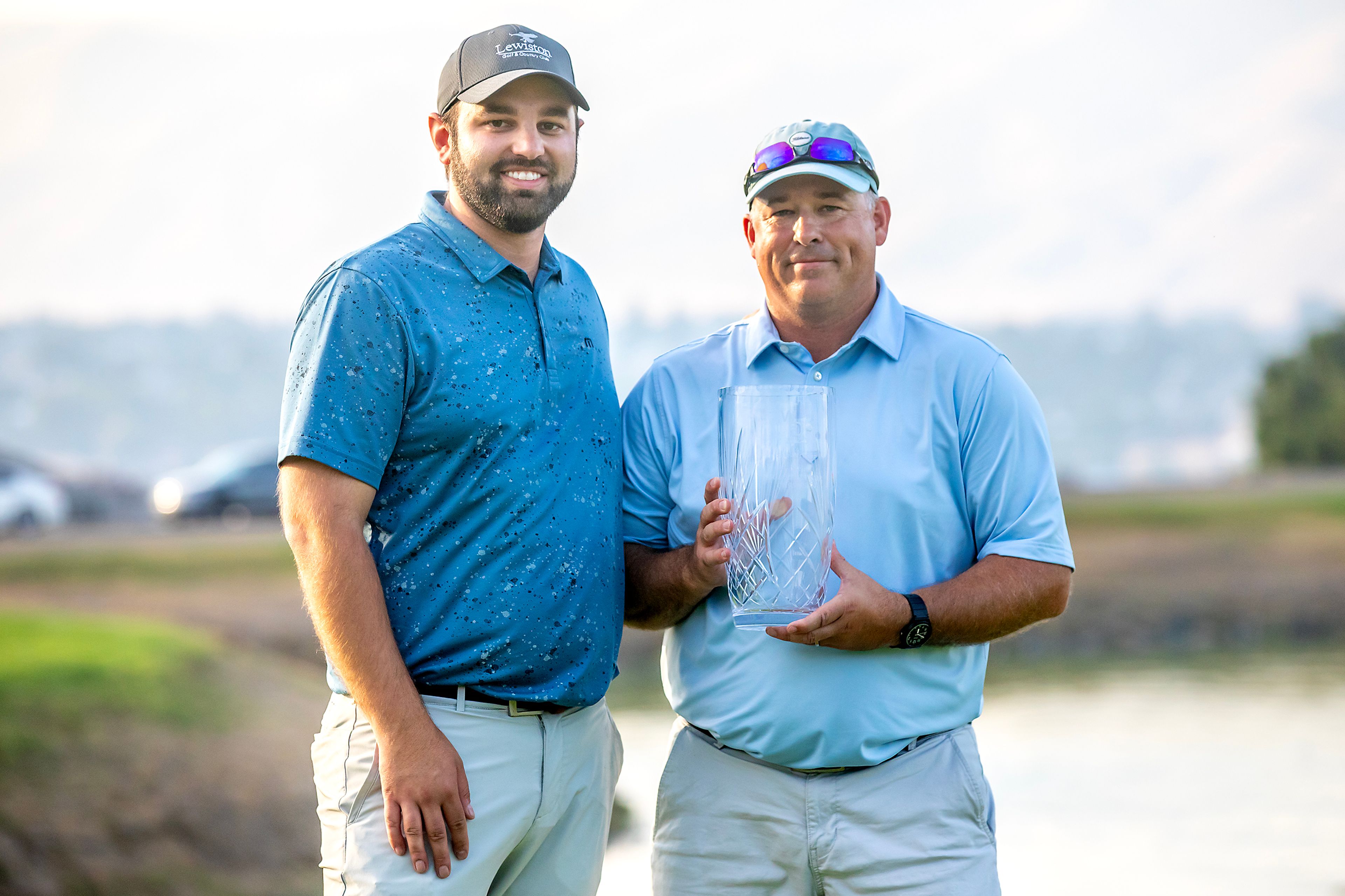 Jason Huff poses for a photo with the Sole Survivor trophy Monday at the Lewiston Golf and Country Club.