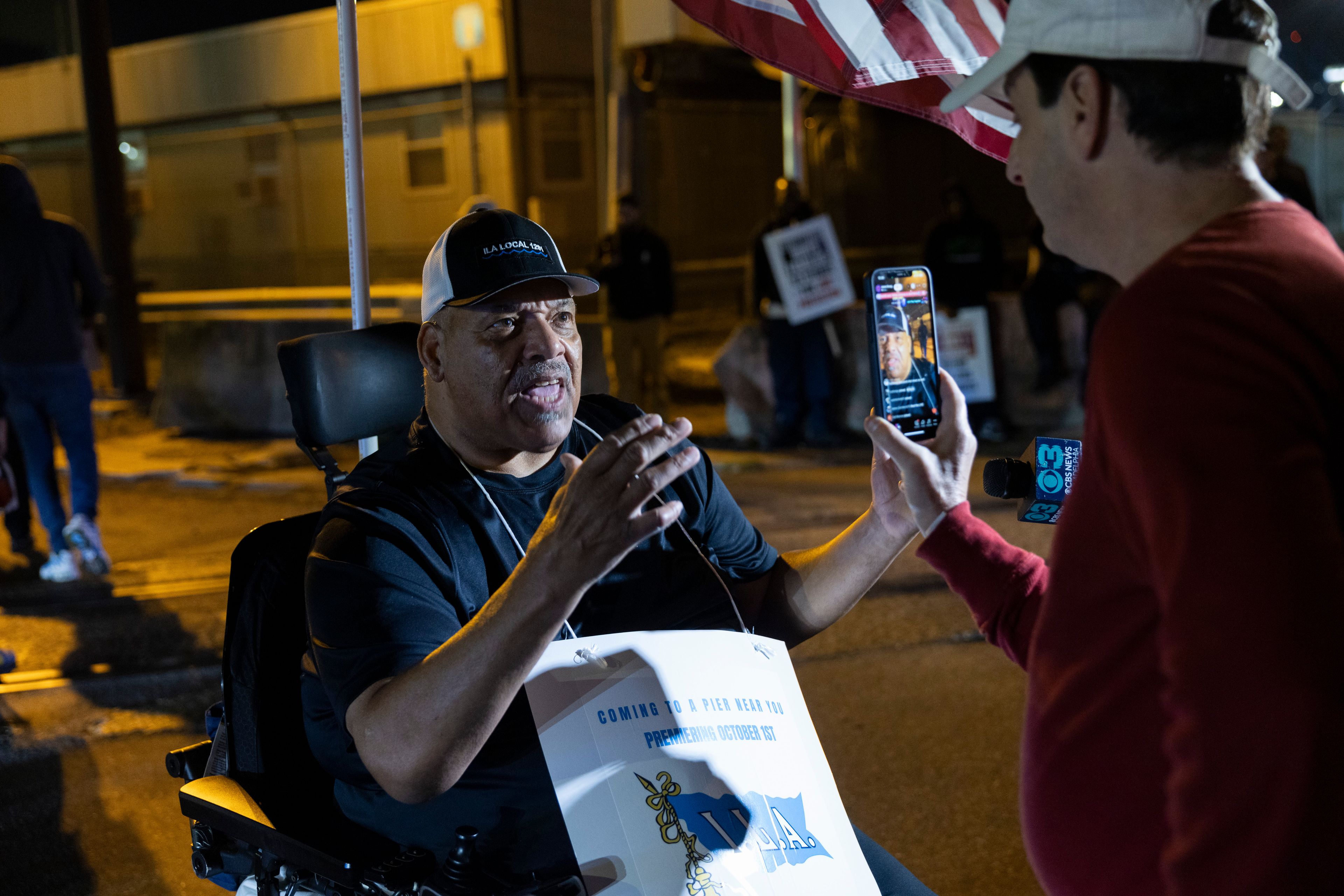 Boise Butler, president of ILA Local 1291, speaks to the press outside the Packer Avenue Marine Terminal Port in Philadelphia, Tuesday, Oct. 1, 2024. (AP Photo/Ryan Collerd)