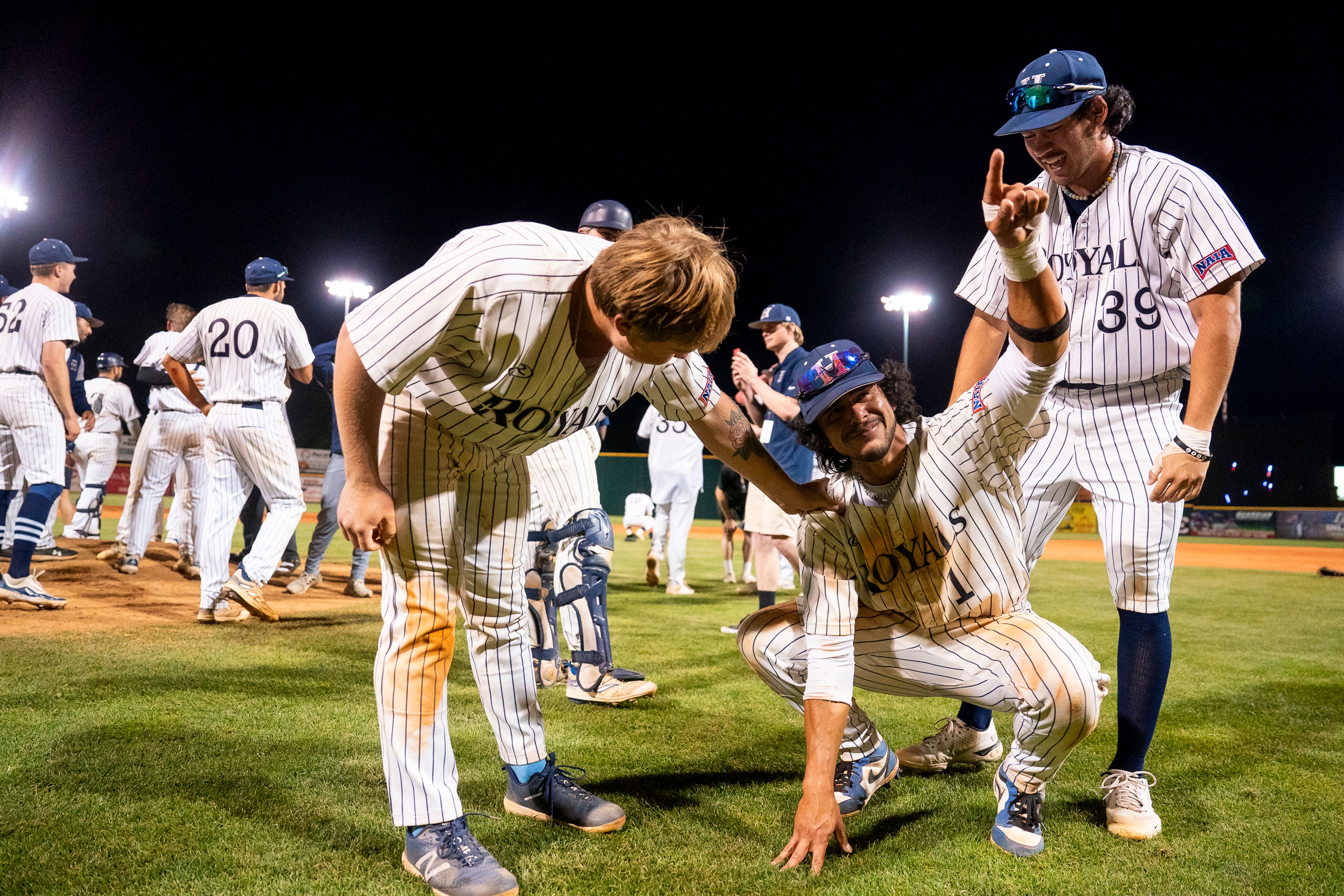 Hope International’s David Rivera (1) points to the crowd after winning Game 19 of the NAIA World Series against Tennessee Wesleyan on Friday at Harris Field in Lewiston.