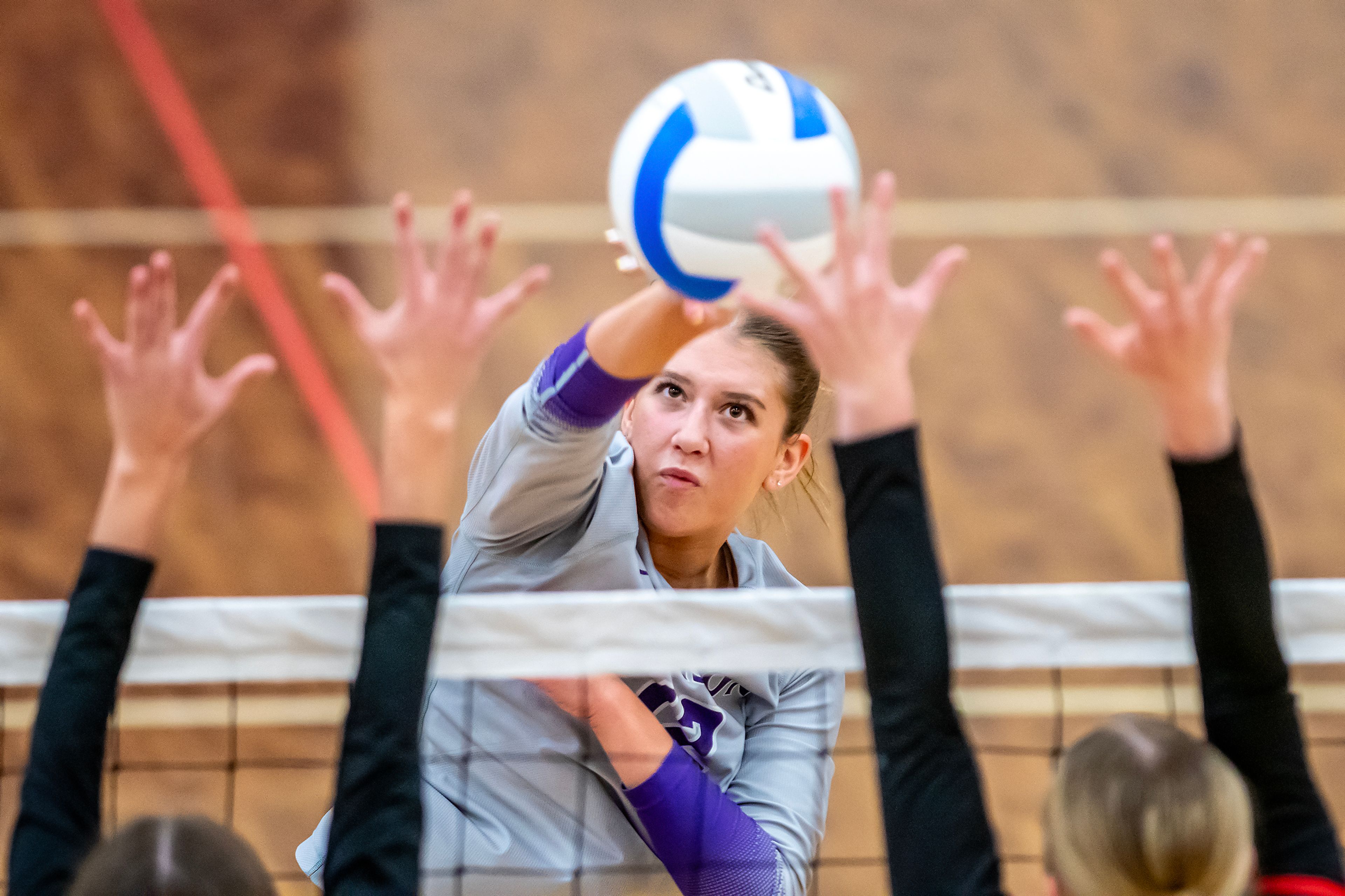 Lewiston outside hitter Addy McKarcher spikes the ball against Moscow in a 5A district tournament match Tuesday in Lewiston.