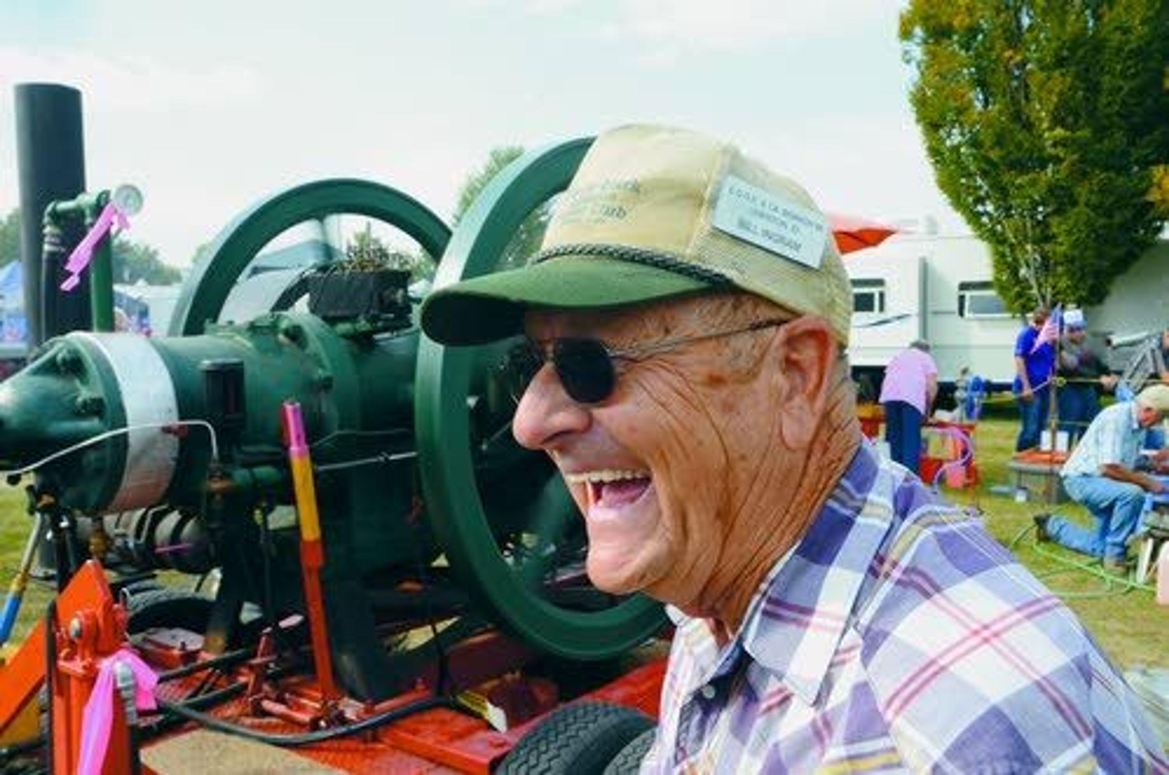 “That’s Dinosaur power.” Said Bill Ingram of Lewiston, as his 6000 pound hit and miss engine roars to life spitting out smoke rings into the blue skies above the Nz Perce County Fair on Thursday morning. Ingram’s colossal engine pumped water from the Snake River for irrigation near Wawaii.