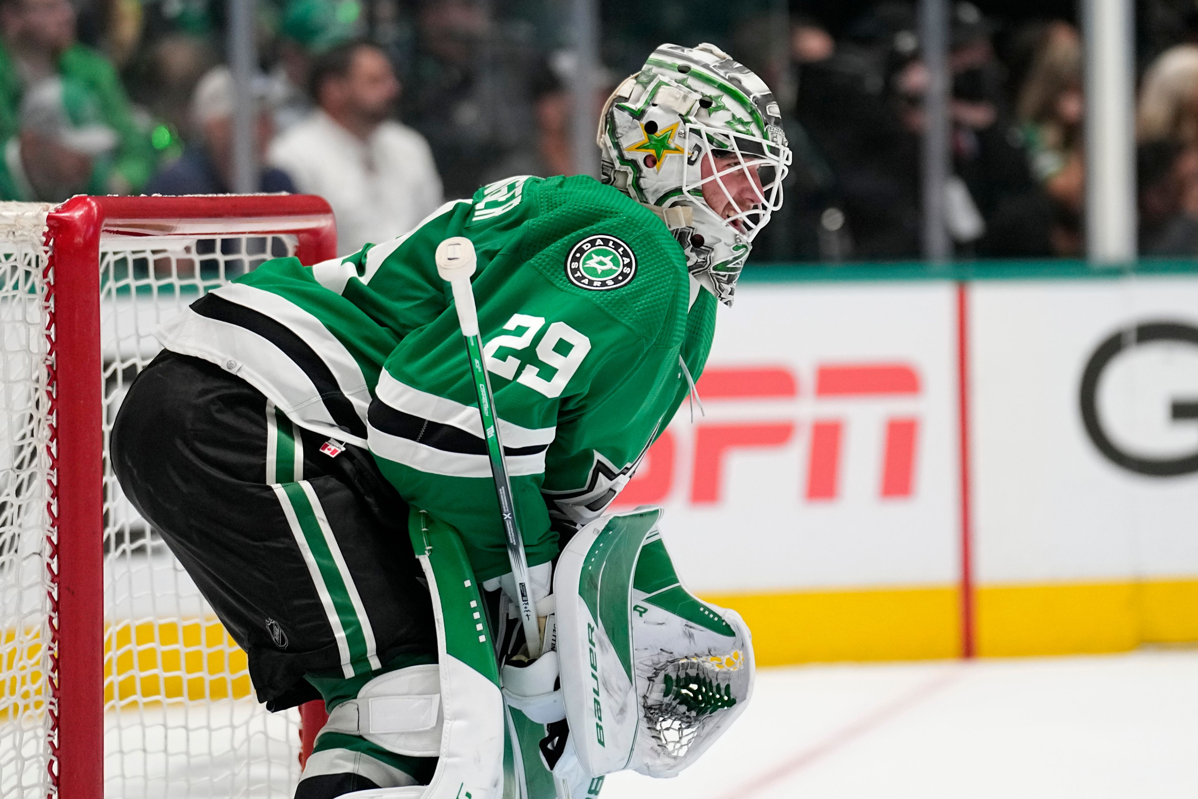 Dallas Stars goaltender Jake Oettinger (29) looks downice after teammate Roope Hintz scored in the second period of Game 7 of an NHL hockey Stanley Cup second-round playoff series against the Seattle Kraken, Monday, May 15, 2023, in Dallas. (AP Photo/Tony Gutierrez)