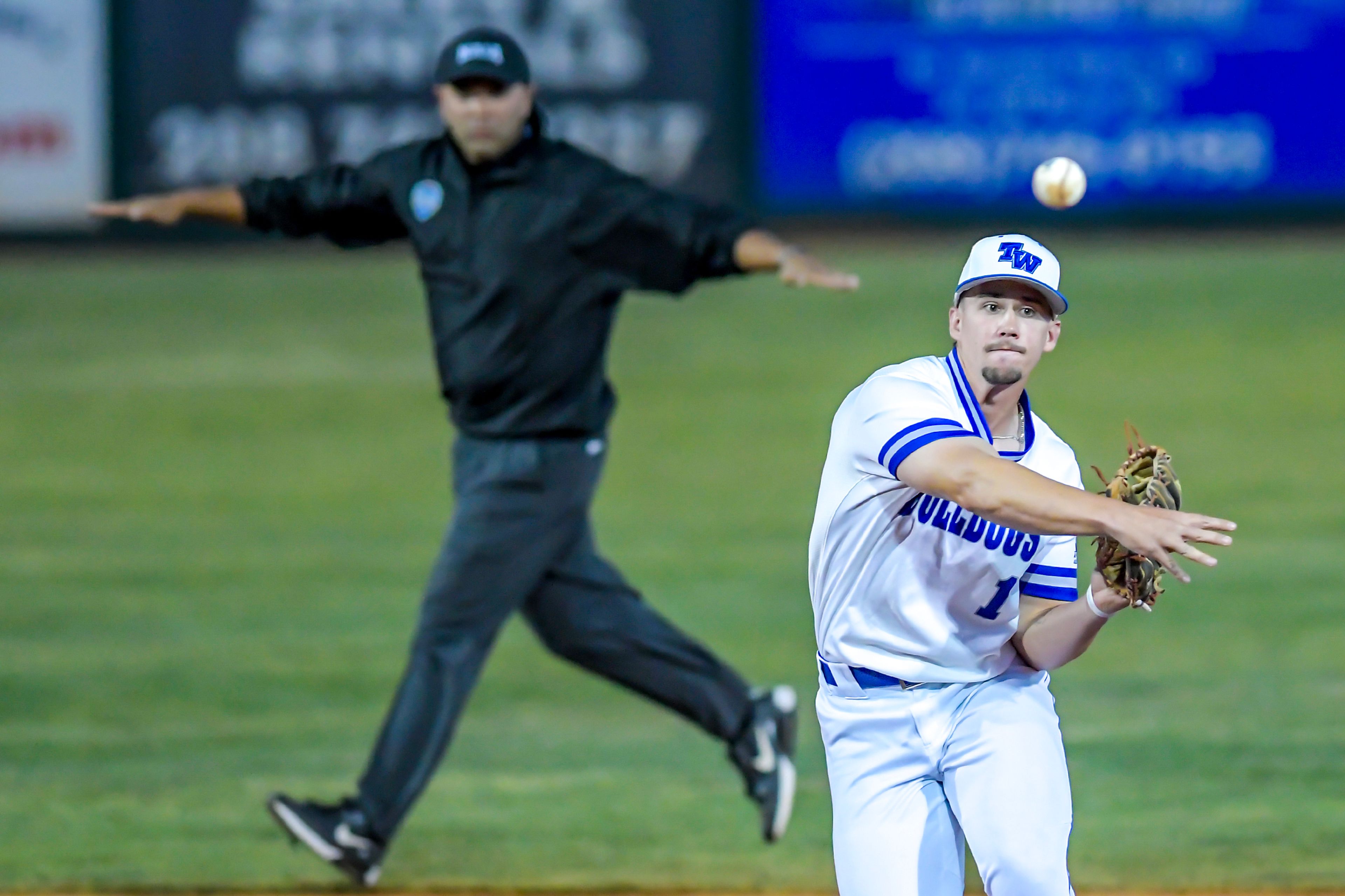 Tennessee Wesleyan second baseman Cayle Webster throws to first base against Georgia Gwinnett in Game 12 of the NAIA World Series at Harris Field Monday in Lewiston.