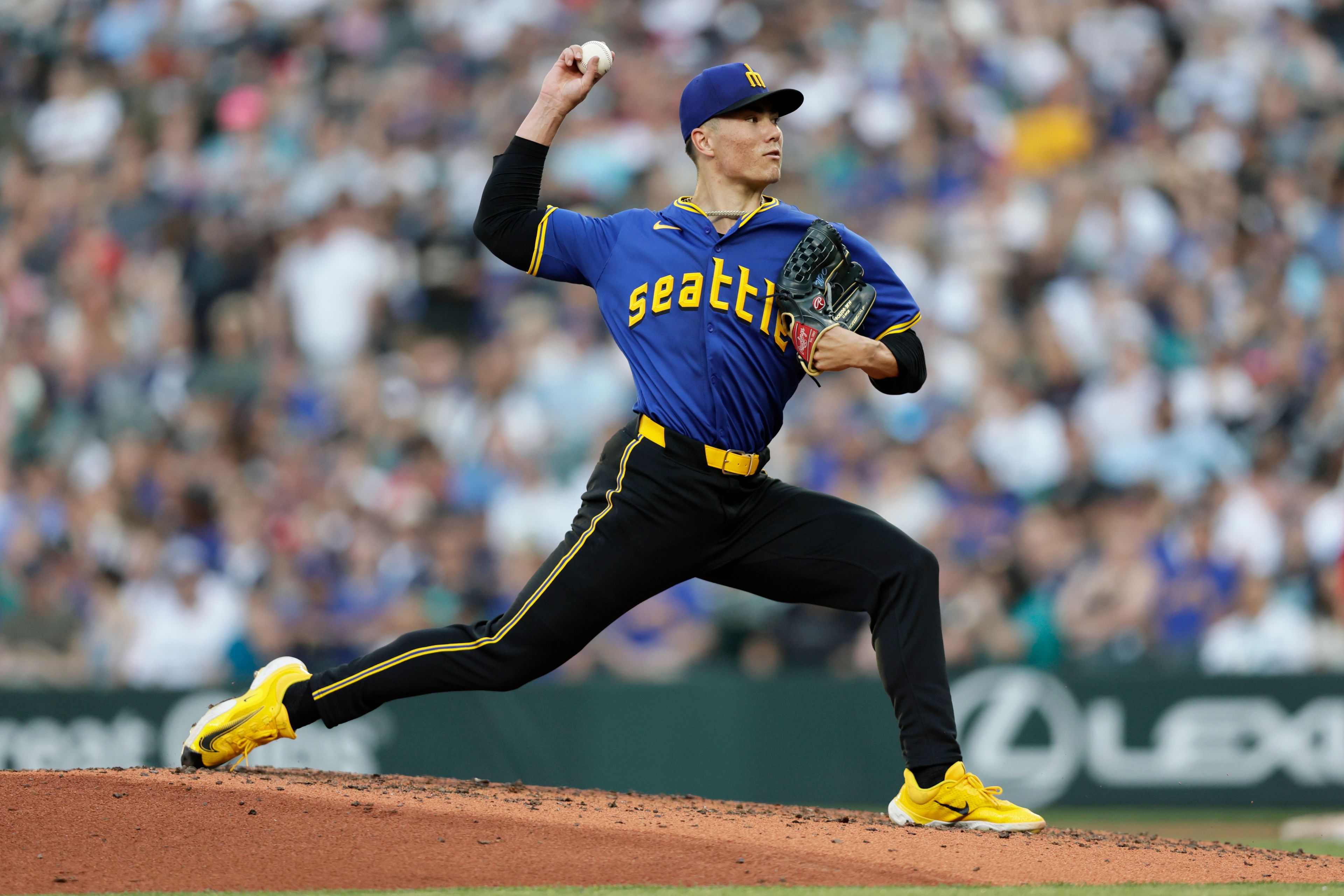 Seattle Mariners starting pitcher Bryan Woo throws against the Philadelphia Phillies during thr\e fourth inning in a baseball game, Friday, Aug. 2, 2024, in Seattle. (AP Photo/John Froschauer)