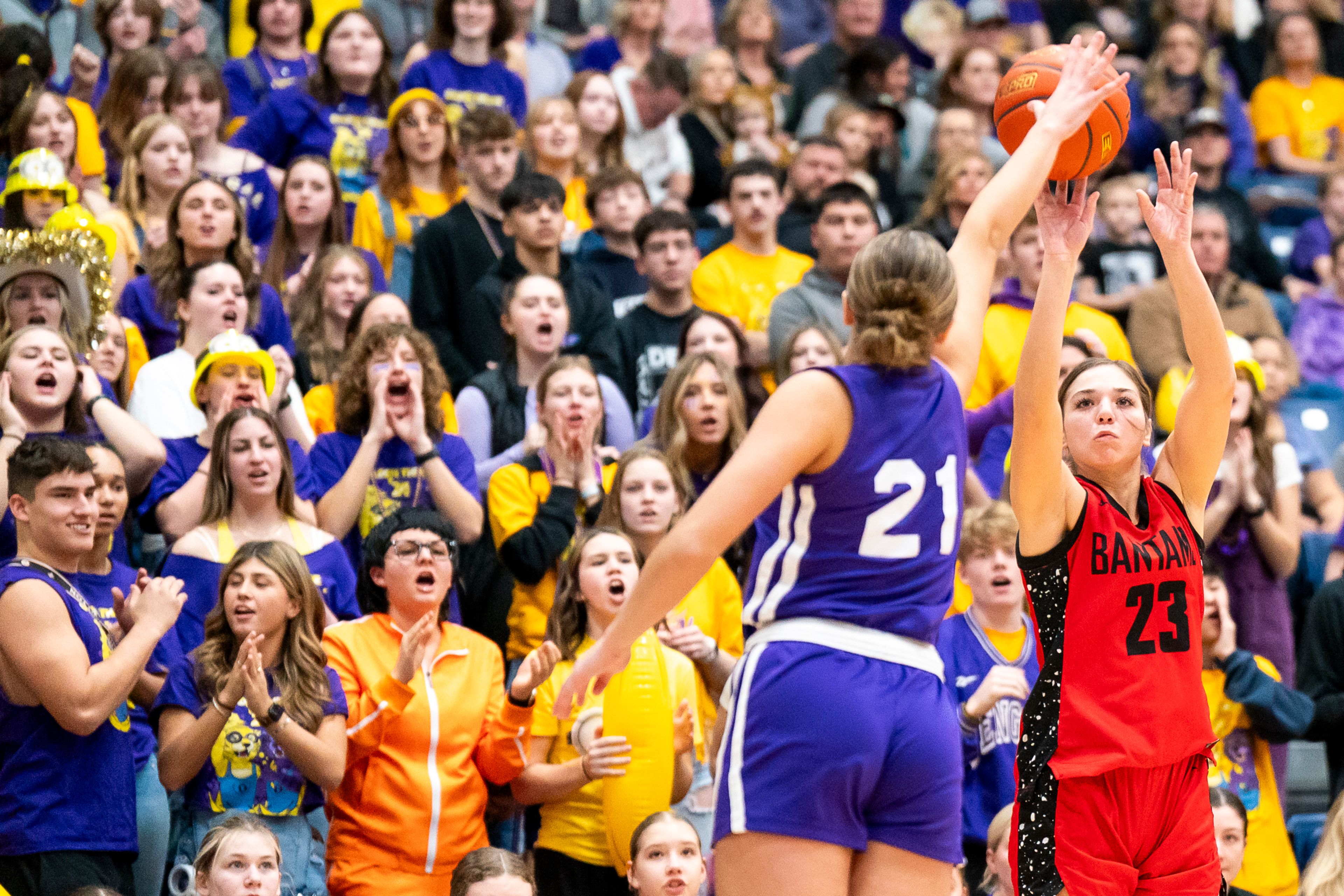 Clarkston’s Alahondra Perez (23) shoots a three-point shot during their Golden Throne rivalry game against Lewiston on Friday inside the P1FCU Activity Center in Lewiston.