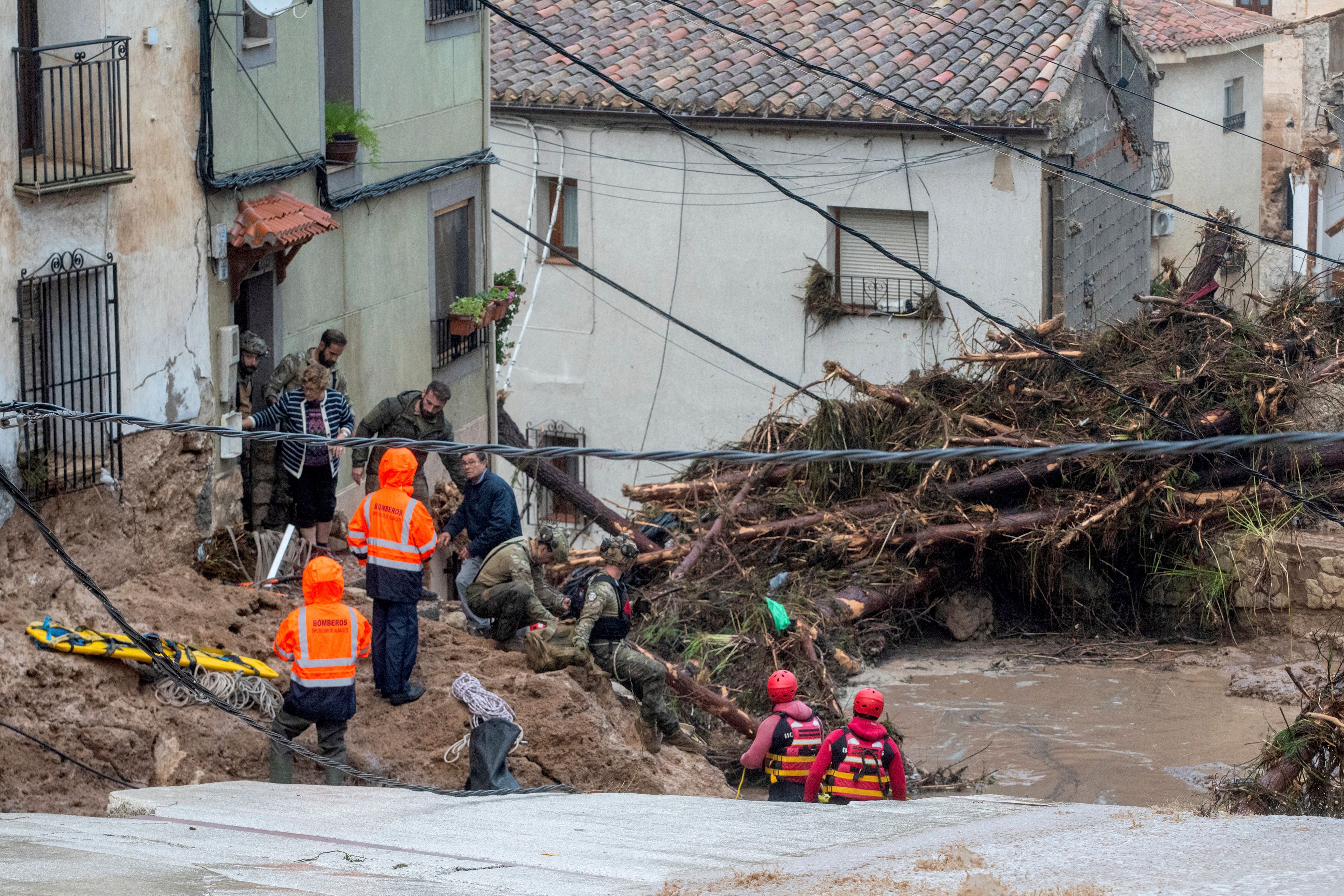 Members of the Spanish army and emergency services rescue people trapped in their homes after floods in Letur, Albacete, Tuesday, Oct. 29, 2024. (VÃ­ctor FernÃ¡ndez/Europa Press via AP)