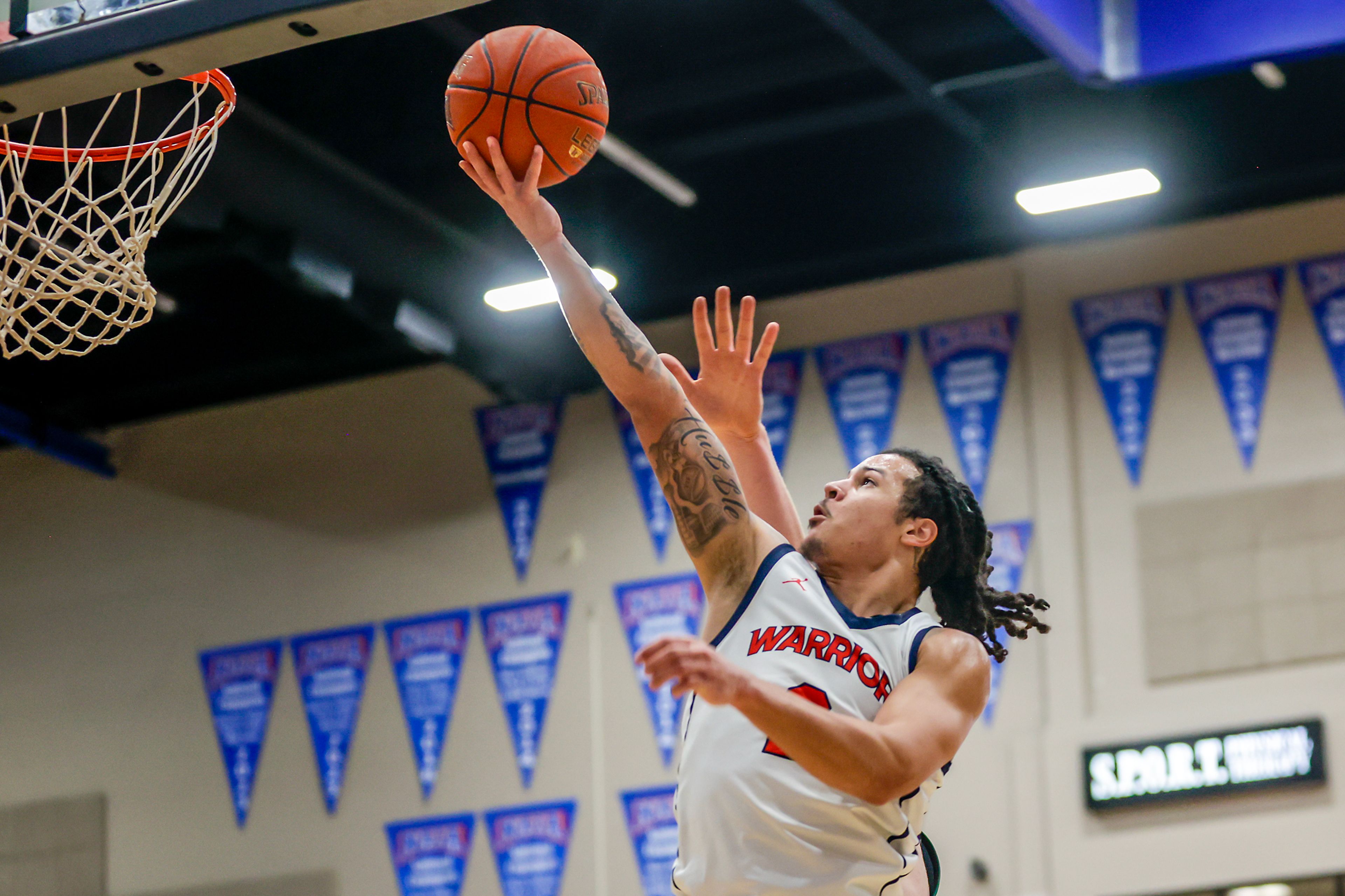 Lewis-Clark State guard MaCarhy Morris shoots a layup against Walla Walla during a quarter of a Cascade Conference game Tuesday at Lewis-Clark State College in Lewiston.