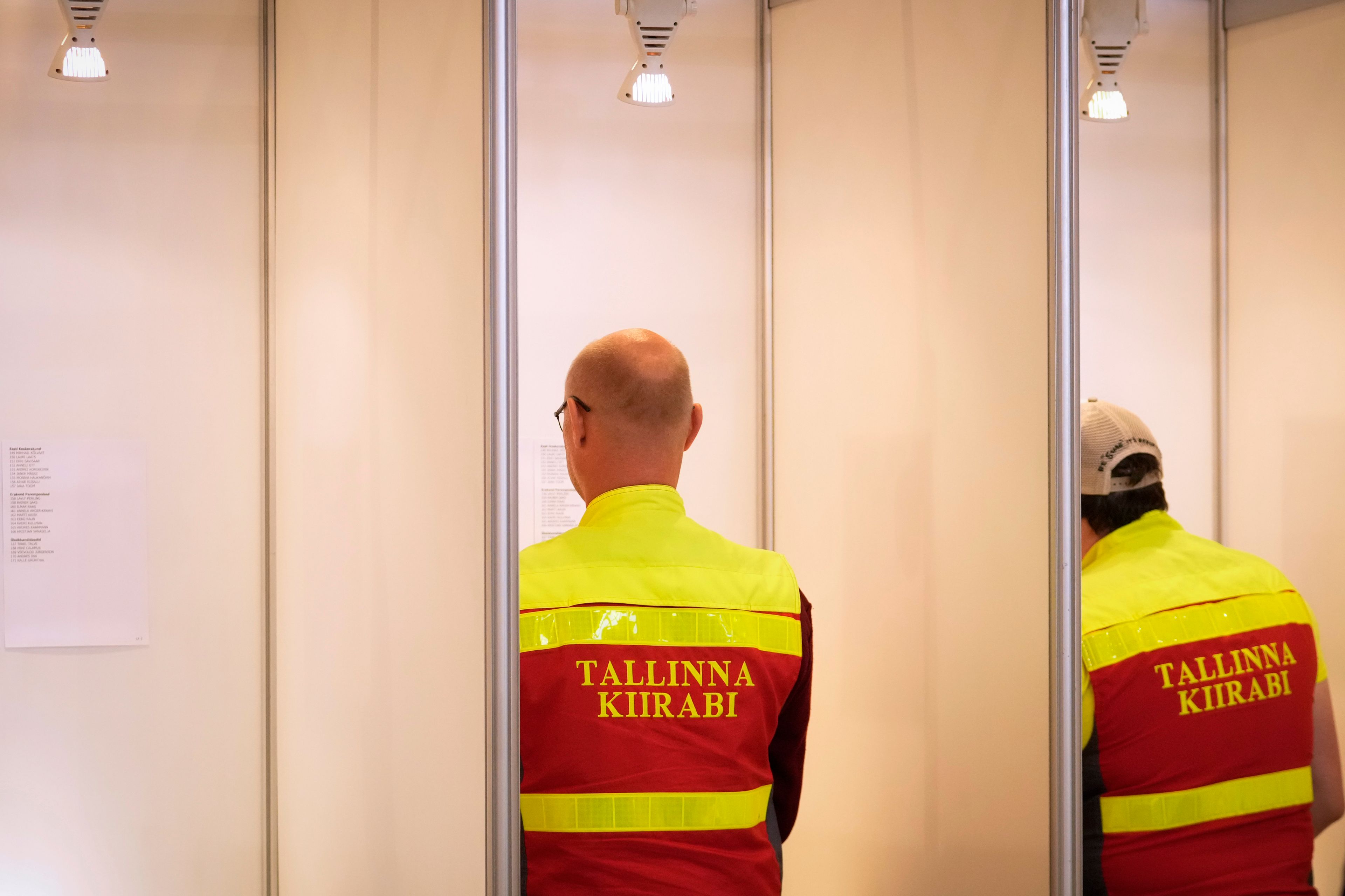 Ambulance workers fill their ballots during the European Parliament election in Tallinn, Estonia, Sunday, June 9, 2024. Polling stations opened across Europe on Sunday as voters from 20 countries cast ballots in elections that are expected to shift the European Union's parliament to the right and could reshape the future direction of the world's biggest trading bloc.