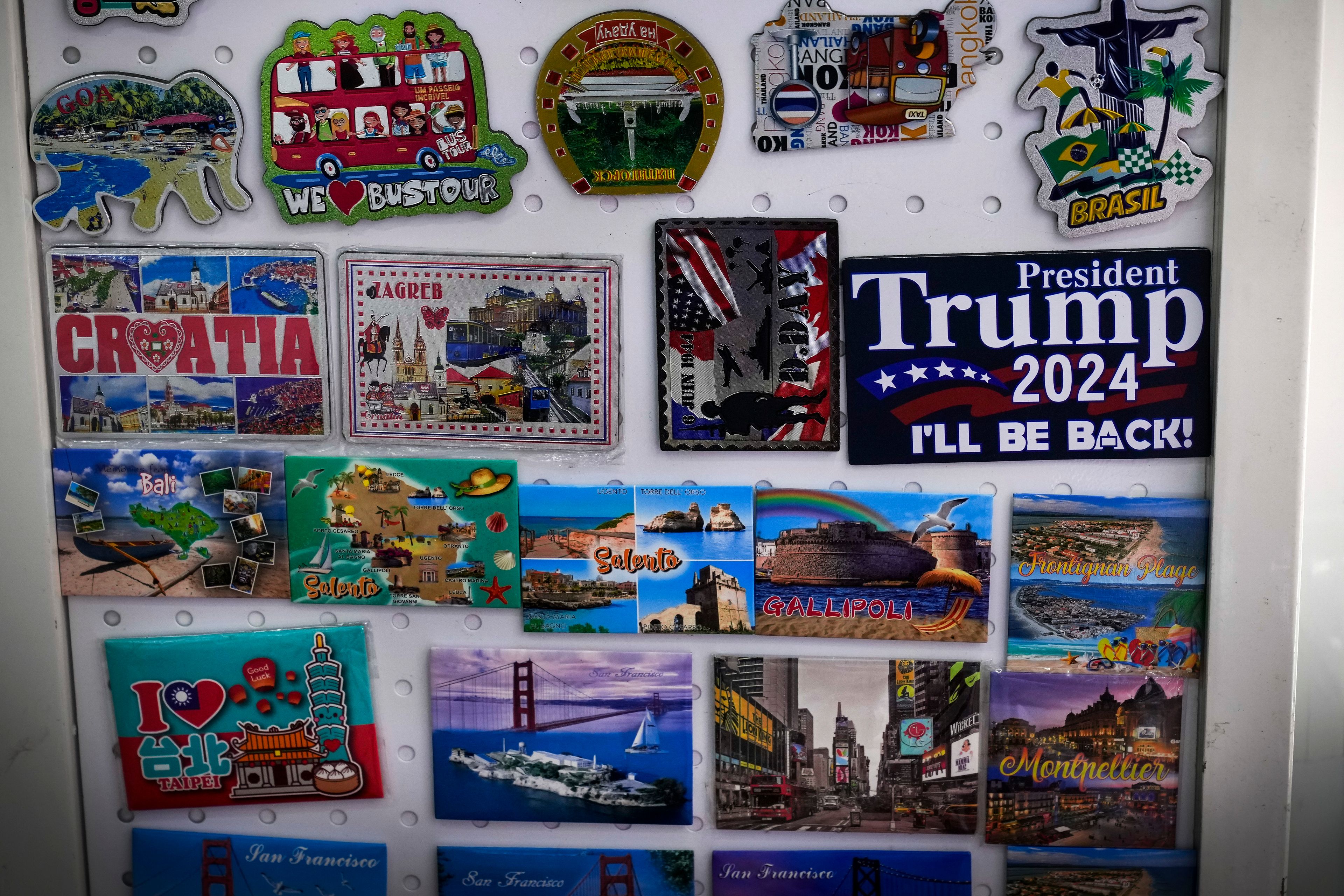 A fridge magnet that reads "President Donald Trump 2024" is displayed at a store at the Yiwu wholesale market in Yiwu, east China's Zhejiang province, Nov. 8, 2024. (AP Photo/Andy Wong)