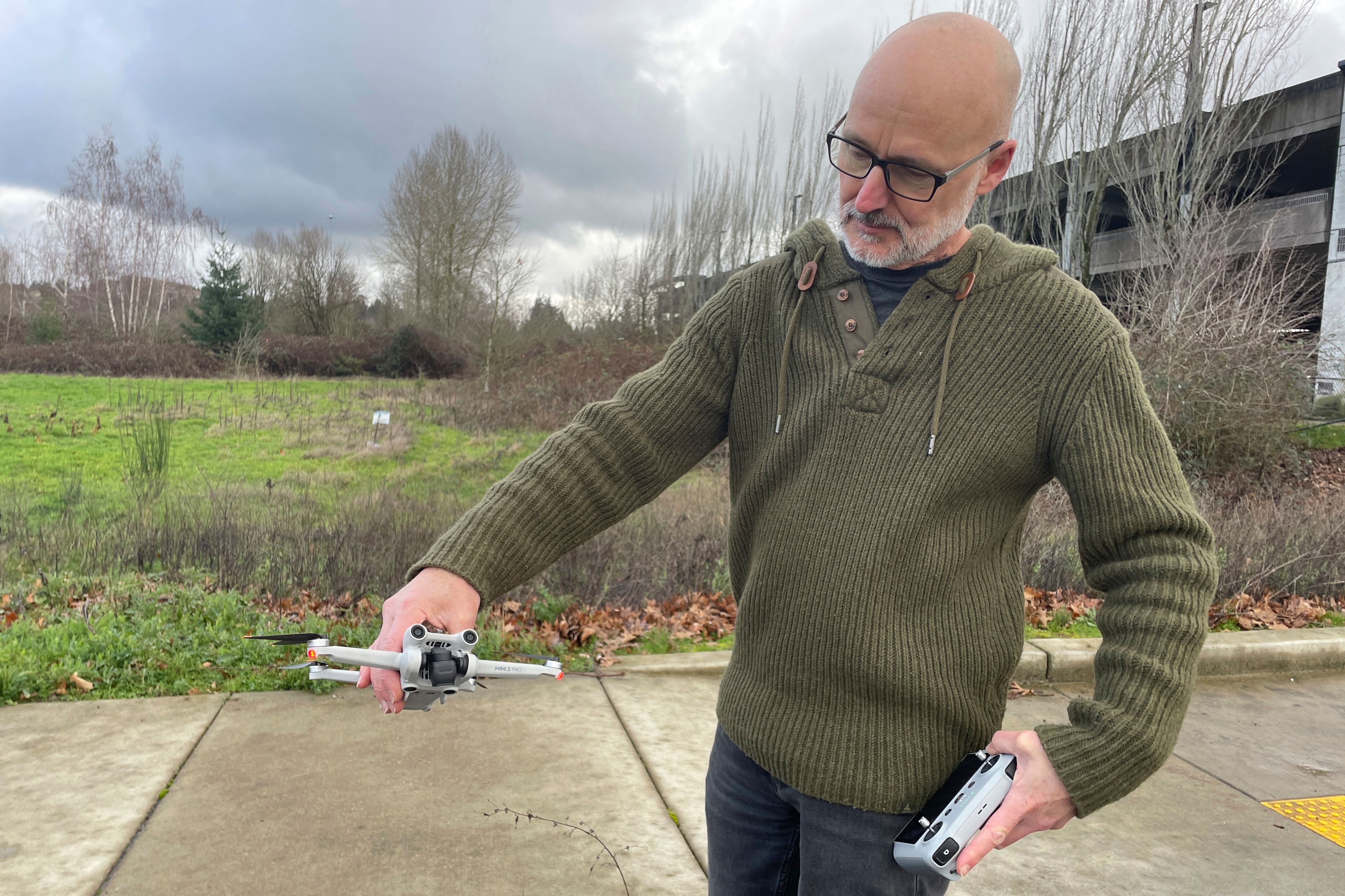 In southwest Portland, Ore., Gavin Redshaw shows the drone he used on Sunday, Jan. 7, 2024, to search for the wreckage of the exit door plug of a Boeing 737 Max 9 that detached during an Alaska Airlines flight on Friday, Jan. 5. (AP Photo/Claire Rush)