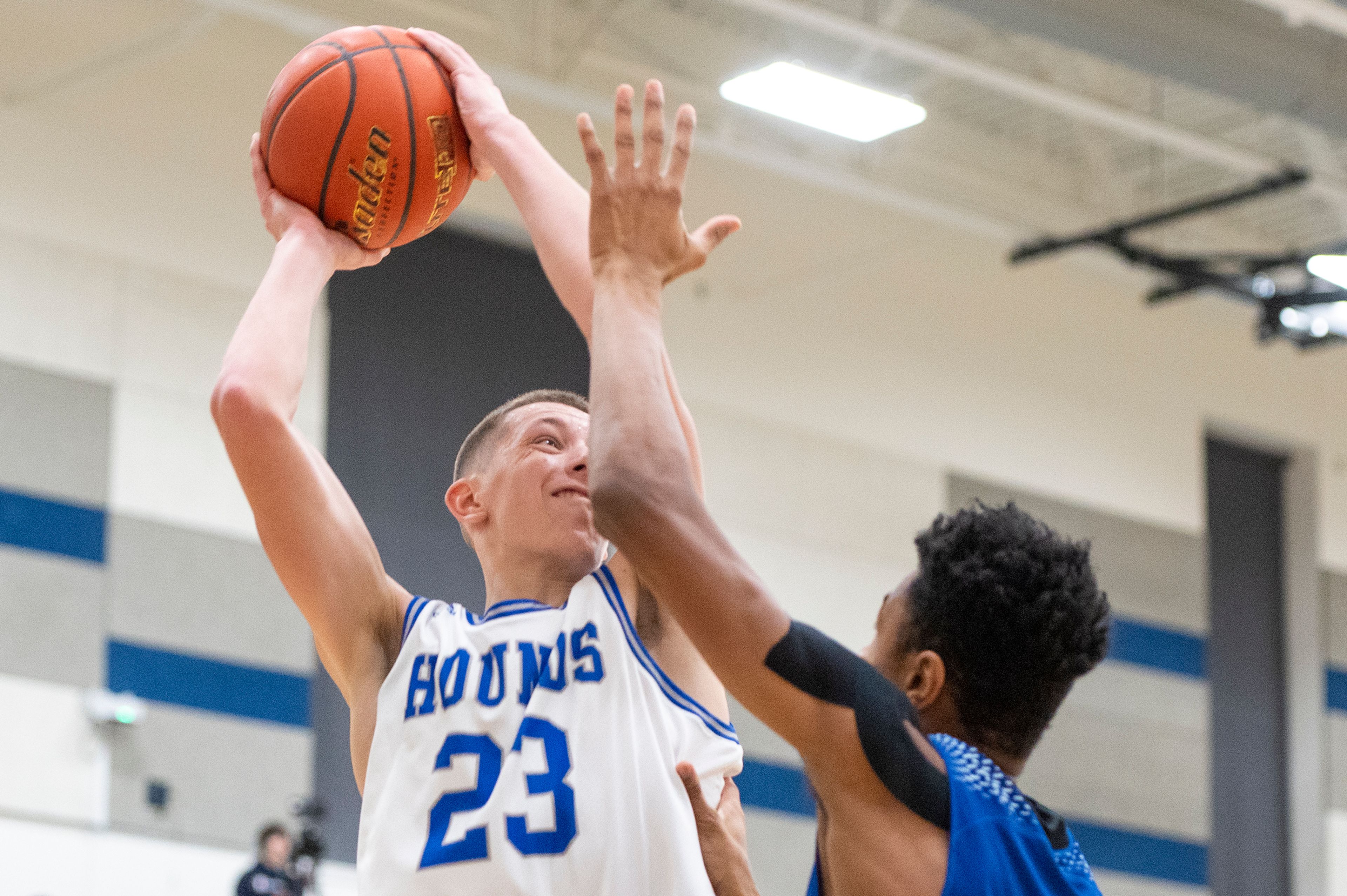 Pullman forward Dane Sykes, left, shoots over Lakeside forward Junior Johnson during Friday's nonleague game.