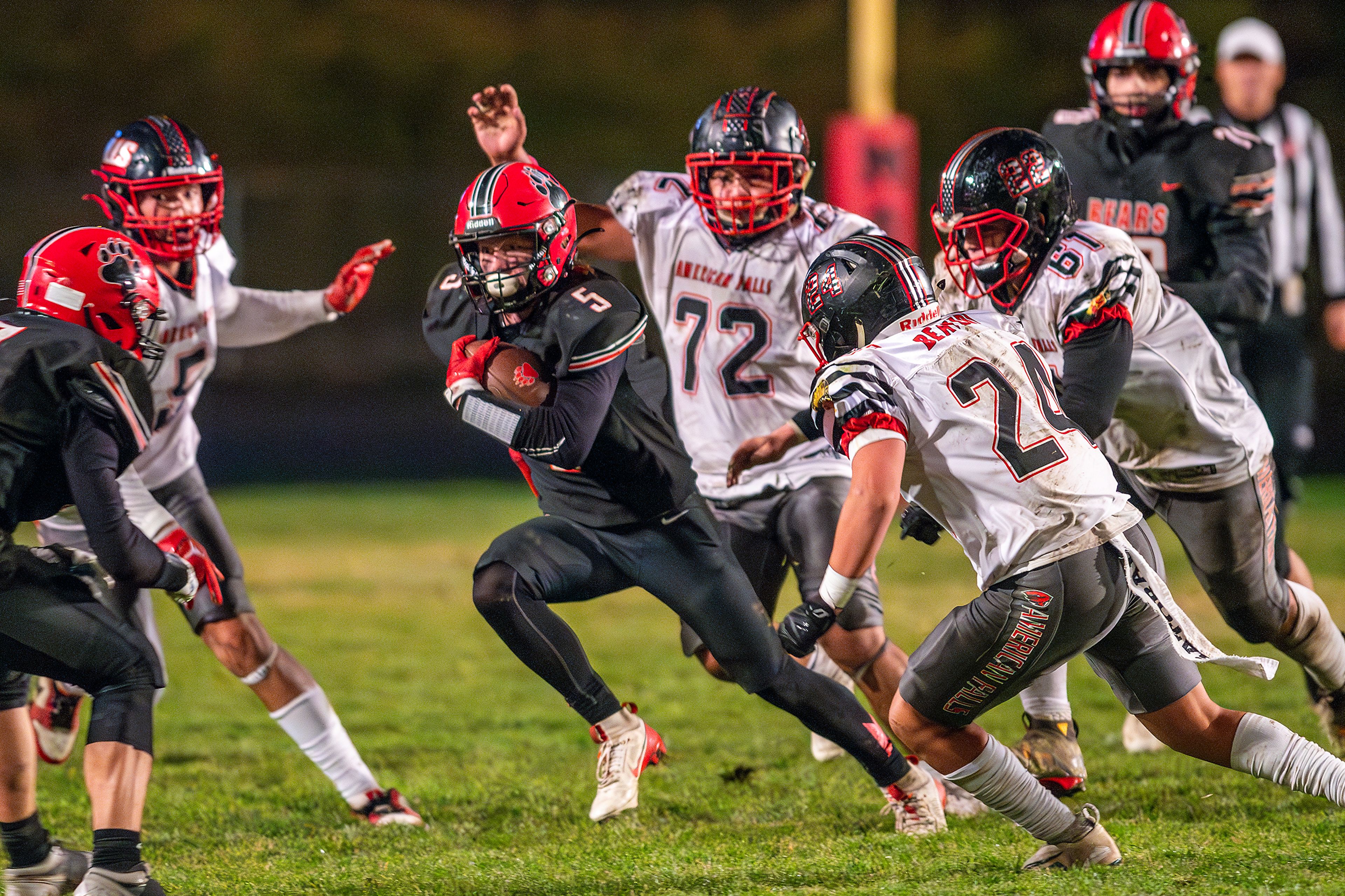 Moscow wide receiver Connor Isakson runs the ball against American Falls during an Idaho 4A playoff game Friday in Moscow.