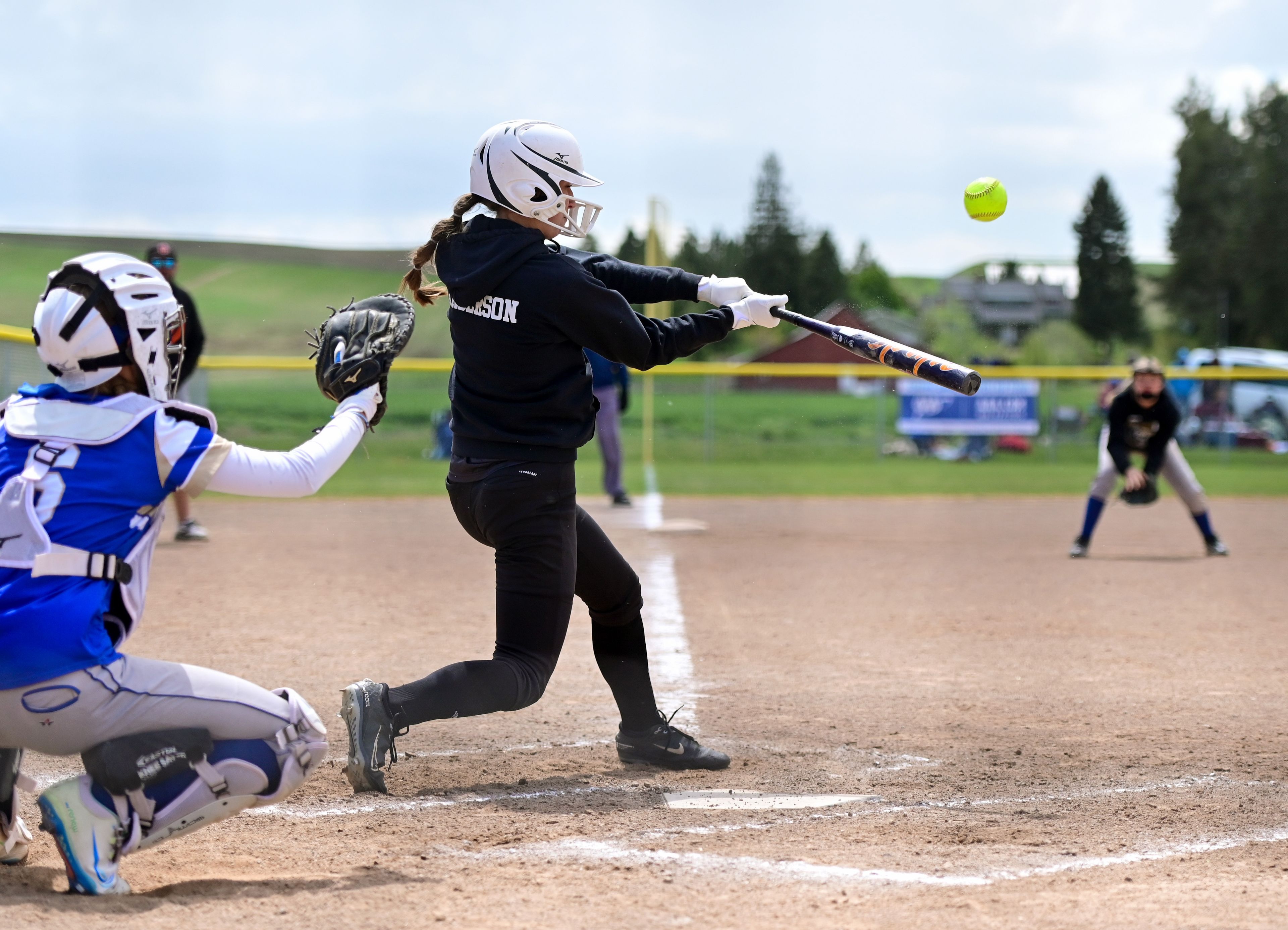 Kendrick’s Hali Anderson swings at a pitch from Genesee during an Idaho Class 1A state championship game Friday in Genesee.