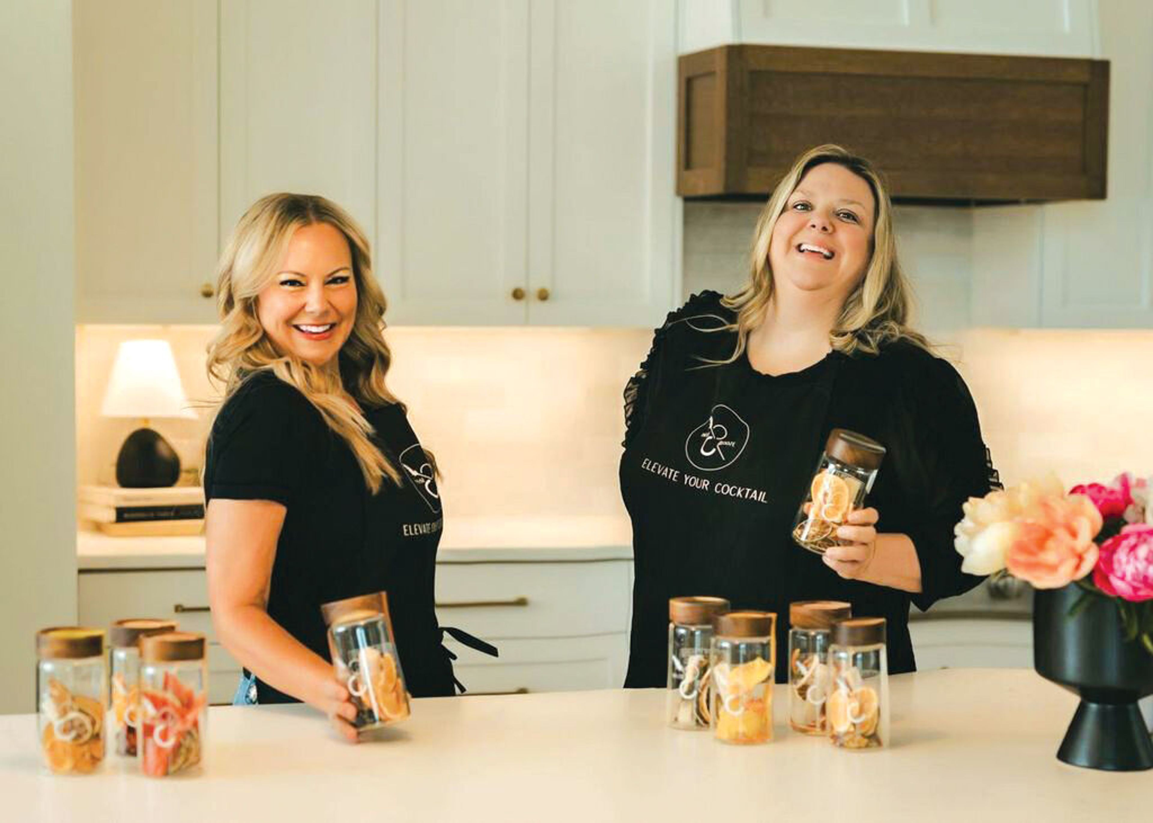 Infuse & Booze co-owners Amy McCall and Jamie Laybourn pose with their infusion kits for cocktails and mocktails.