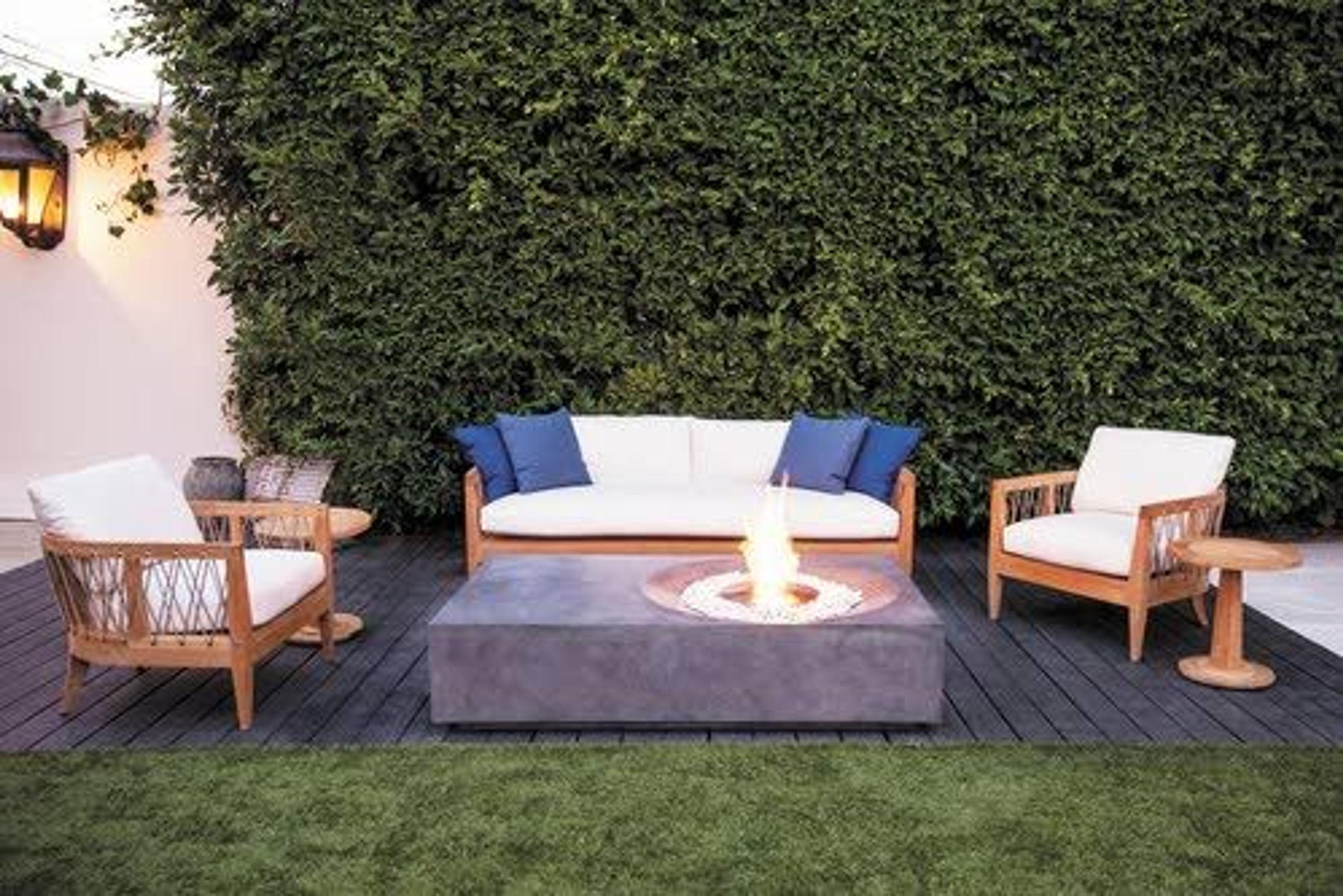 The Equinox table by Brown Jordan Fires was designed to combine the convenience of a coffee table (this one is 65 inches by 39 inches) with the warmth of a fire pit.